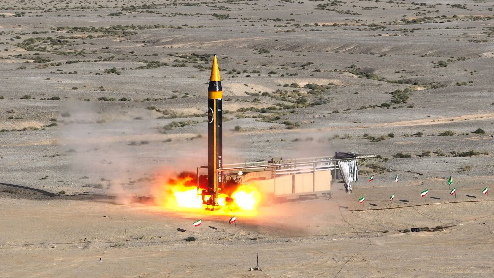 A handout picture provided by Iran's Defence Ministry on May 25, 2023, shows the testing of the fourth generation Khorramshahr ballistic missile, named Khaibar, at an undisclosed location. Iran's defence ministry unveiled a new ballistic missile with a range of 2,000 kilometres (1,242 miles) and a capacity to carry warheads weighing over a tonne. The Kheibar missile -- the latest version of the Khorramshahr which is Iran's longest-range missile to date -- was unveiled alongside a replica of the Al-Aqsa mosque in east Jerusalem, in a live broascast on state television. (Photo by IRANIAN DEFENCE MINISTRY / AFP) / == RESTRICTED TO EDITORIAL USE - MANDATORY CREDIT 