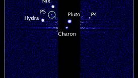 Una nueva luna se dejó fotografiar al lado de Plutón