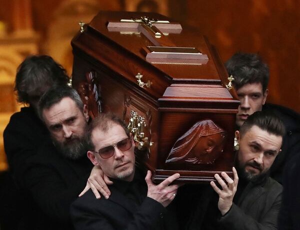 The coffin of Cranberries singer Dolores O'Riordan is removed from St Joseph's Church in Limerick, Ireland, Sunday, Jan. 21, 2018. O'Riordan, 46, was found dead Monday morning at a London hotel. (Niall Carson/PA via AP)