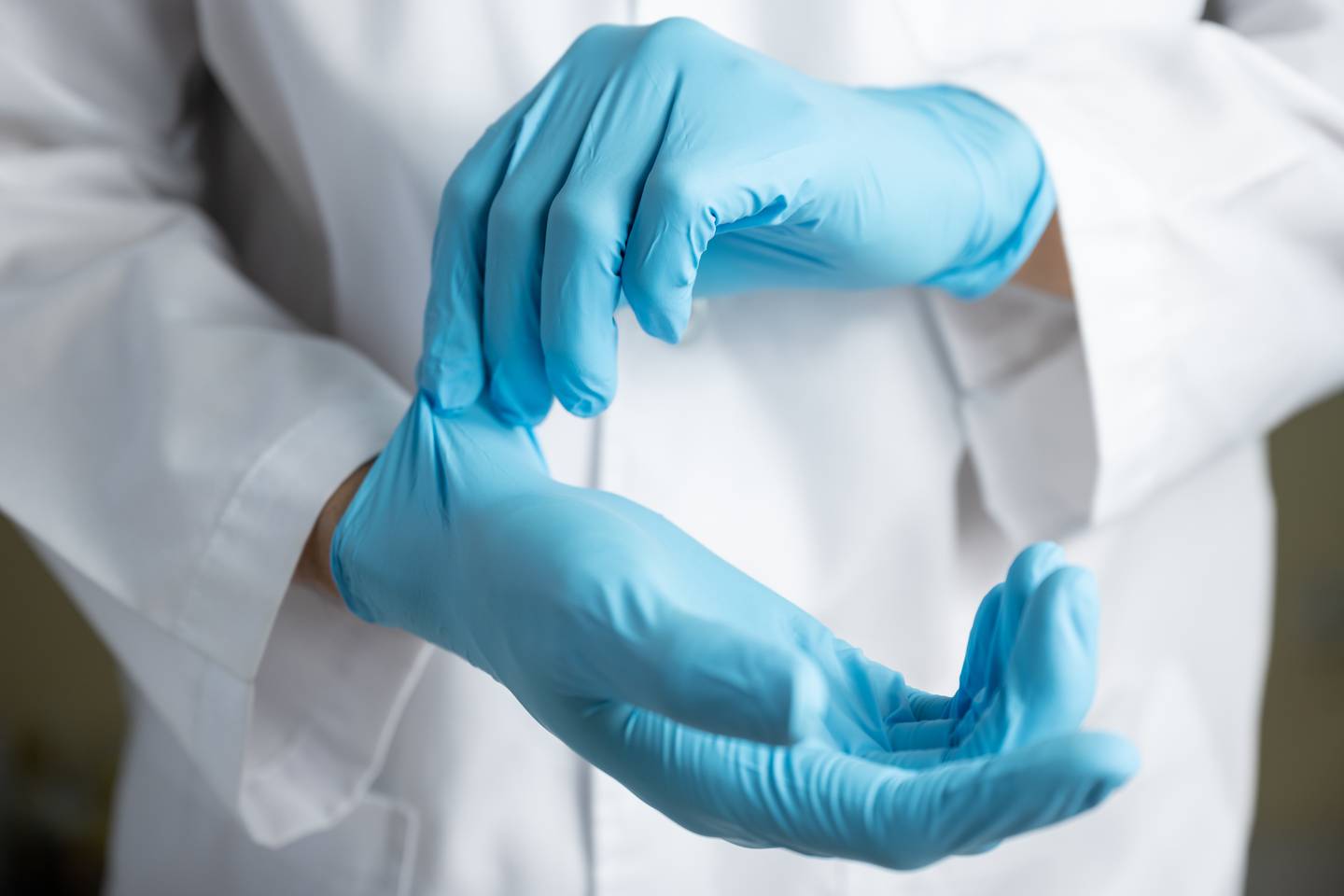Doctor, examen médico, guantes fotografía Shutterstock