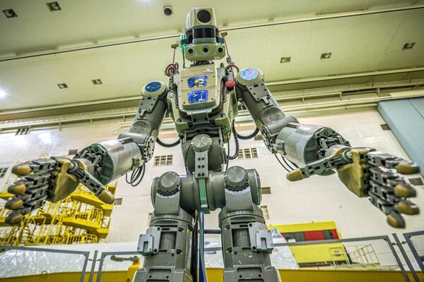 This handout picture taken on July 26, 2019 and released by the official website of the Russian State Space Corporation ROSCOSMOS on August 21, 2019 shows Russian humanoid robot Skybot F-850 (Fedor) being tested ahead of its flight on board Soyuz MS-14 spacecraft at the Baikonur Cosmodrome in Kazakhstan. - Russia space agency Roscosmos is about to send a humanoid robot to the International Space Station. Skybot F-850 will be sent to the ISS on August 22 on board the Soyuz MS-14 spacecraft, and will spend over two weeks there before returning to Earth on September 7. It's the first time that a robot will take the commander's place in a Soyuz � the Skybot will monitor and report on conditions during the otherwise uncrewed flight. (Photo by - / Roscosmos space agency / AFP) / RESTRICTED TO EDITORIAL USE - MANDATORY CREDIT 
