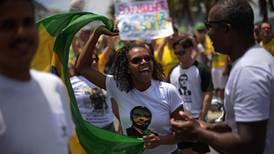 Dos gais y una mujer negra cuentan por qué votarán por Bolsonaro 