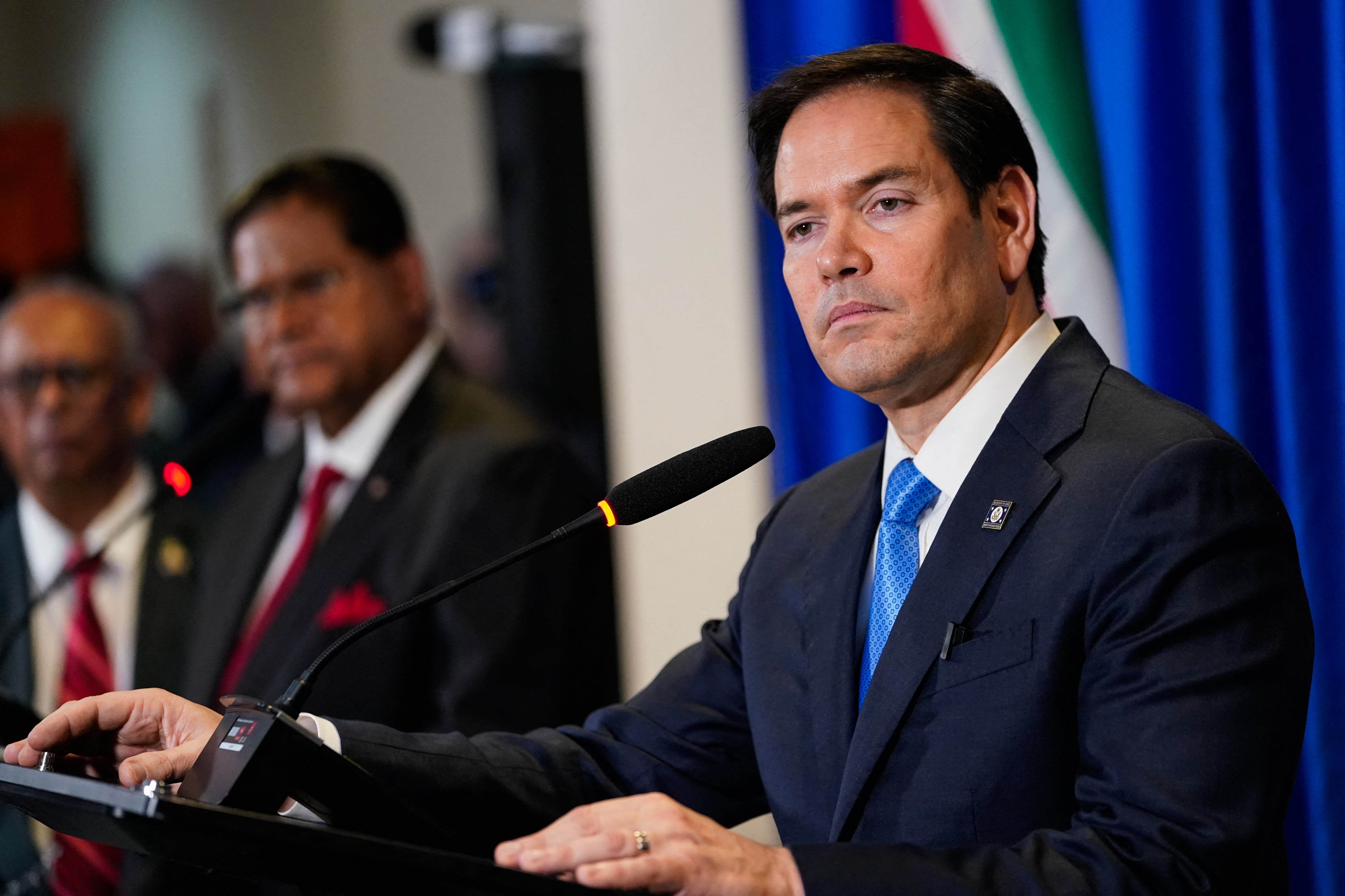 US Secretary of State Marco Rubio speaks during a press conference with Suriname's President Chan Santokh (C), in Paramaribo, Suriname, on March 27, 2025.