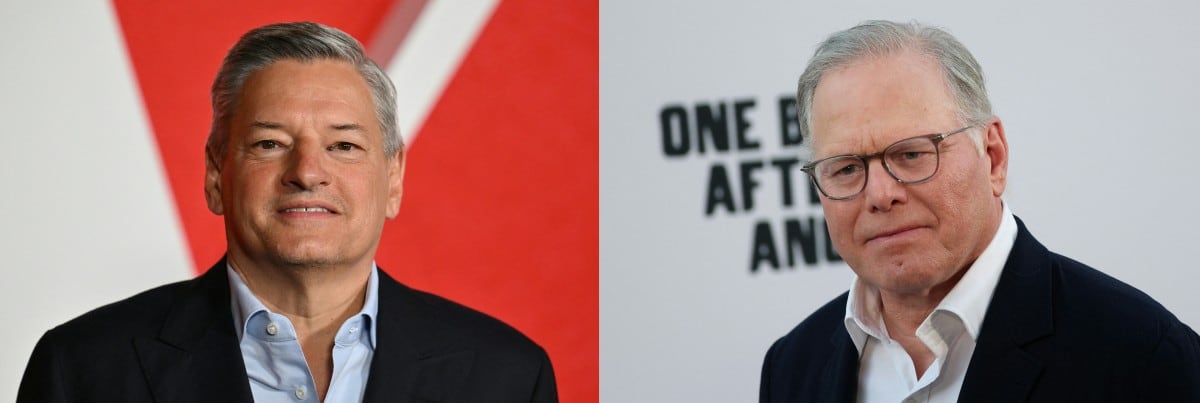 El CEO de Netflix, Ted Sarandos, y el de Warner, David Zaslav, quienes acordaron fusión de sus empresas por $82.000 millones.