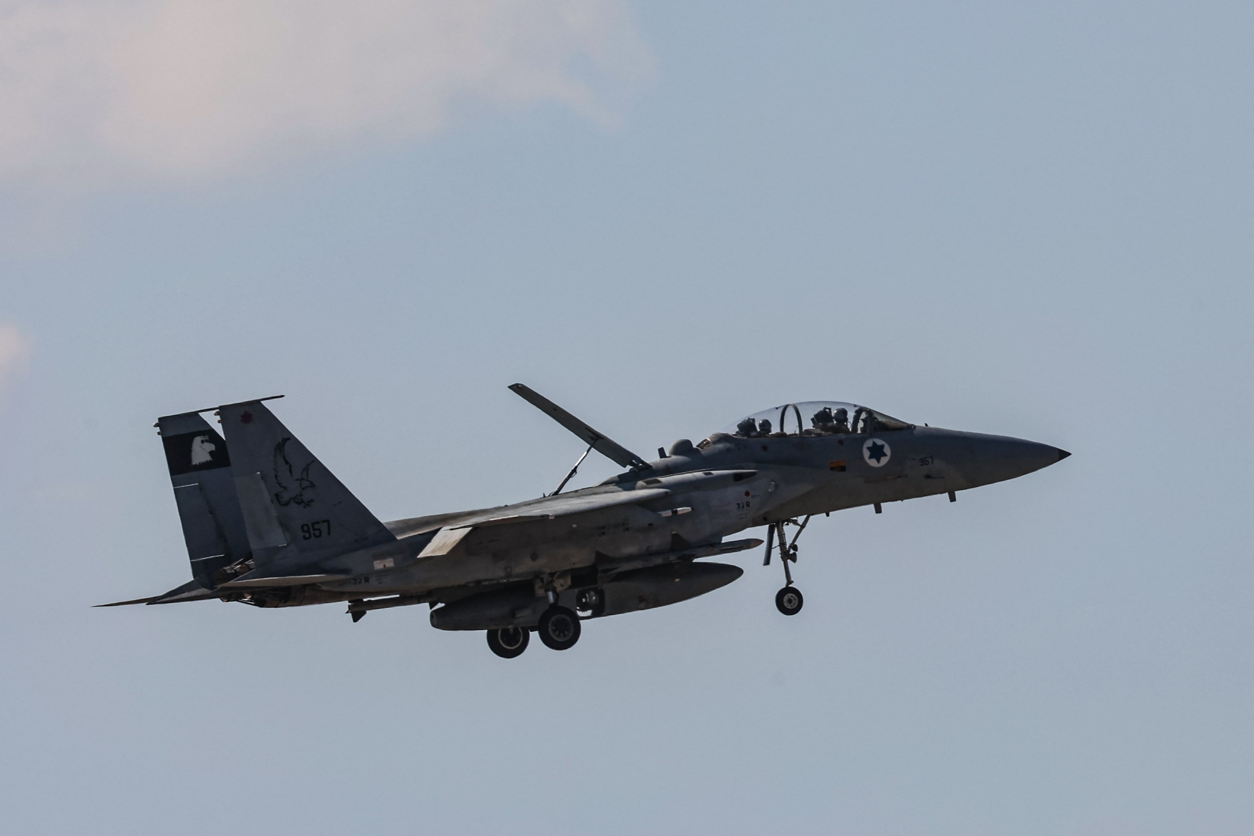 An Israeli fighter jet returning to base flies above an area near Tel Aviv on September 26, 2024. Israel's defence ministry said on September 26 that it had secured an $8.7 billion aid package from the United States to support the country's ongoing military efforts, including upgrading air defence systems. (Photo by GIL COHEN-MAGEN / AFP)