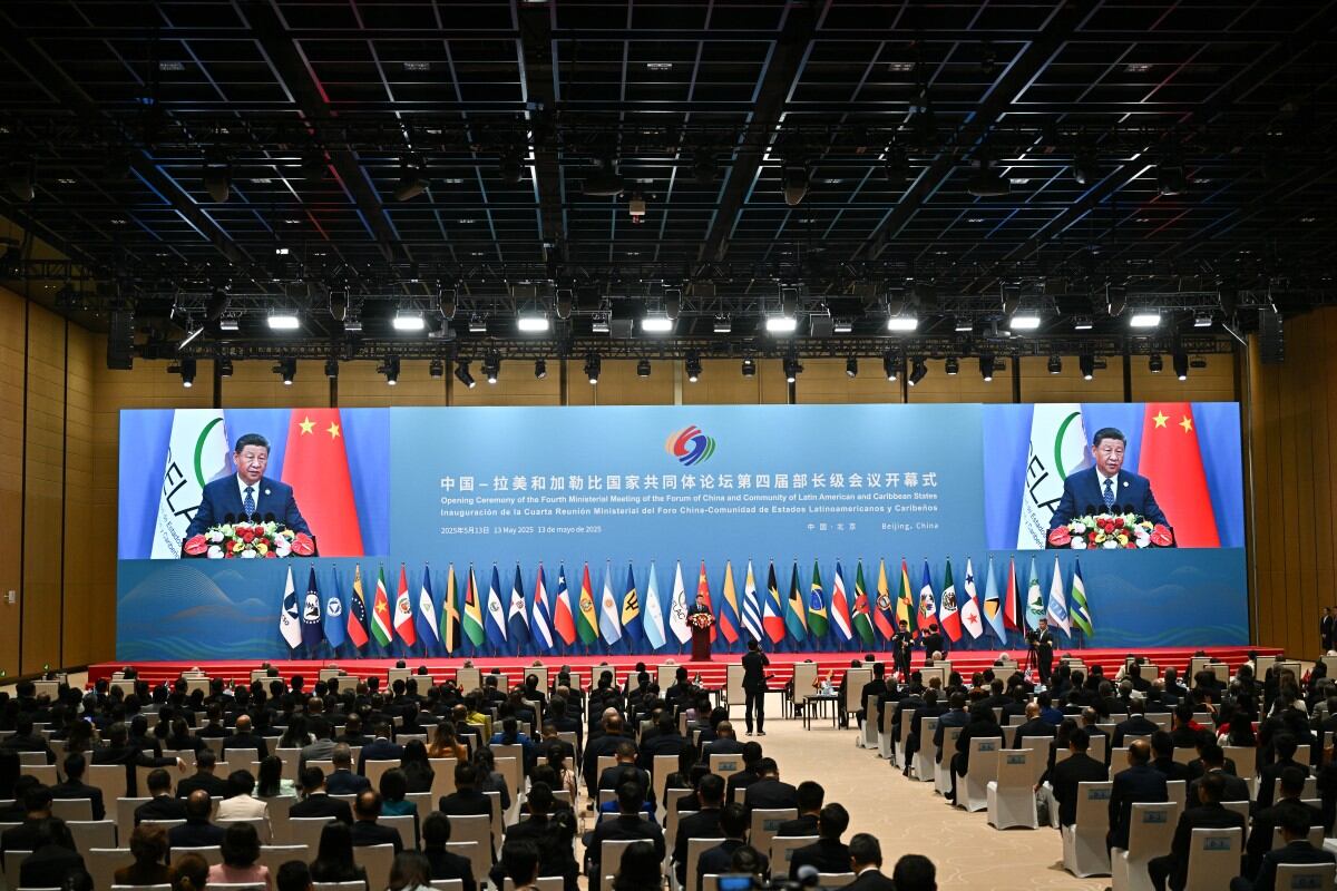 Chinese President Xi Jinping applauds after a joint press conference with Brazil's President Luiz Inacio Lula da Silva (not pictured) at the Great Hall of the People in Beijing on May 13, 2025. (Photo by TINGSHU WANG / POOL / AFP)