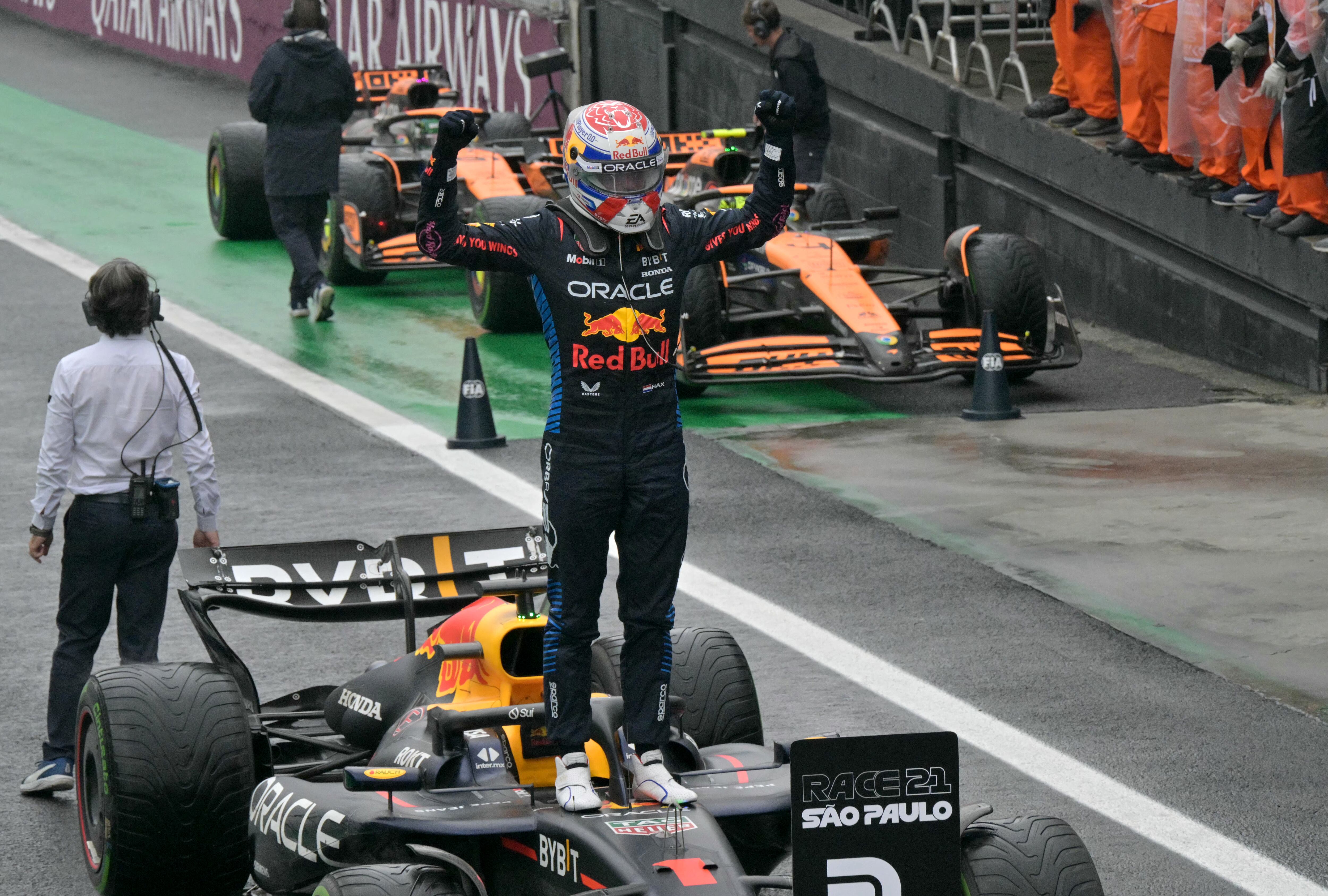 Red Bull Racing's Dutch driver Max Verstappen celebrates after winning the Formula One Sao Paulo Grand Prix, at the Jose Carlos Pace racetrack, aka Interlagos, in Sao Paulo, Brazil, on November 3, 2024. (Photo by NELSON ALMEIDA / AFP)