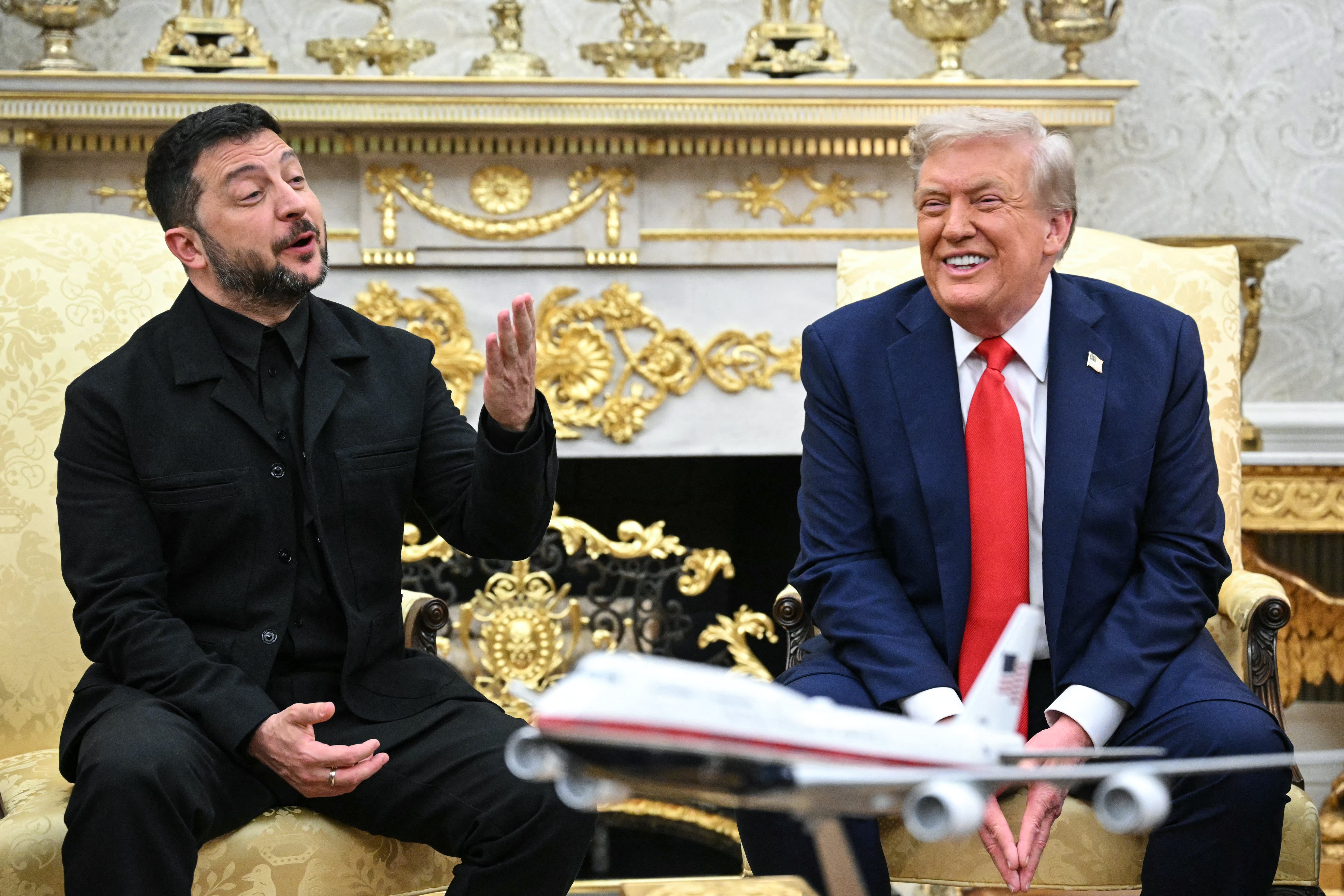 Ukrainian President Volodymyr Zelensky and US President Donald Trump participate in a meeting in the Oval Office of the White House in Washington, DC, on August 18, 2025. European leaders join Ukrainian President Volodymyr Zelensky in talks with US President Donald Trump on August 18, as they try to find a way to end Russia's offensive. The leaders heading to Washington on Monday to appear alongside Zelensky call themselves the "coalition of the willing." (Photo by Mandel NGAN / AFP)