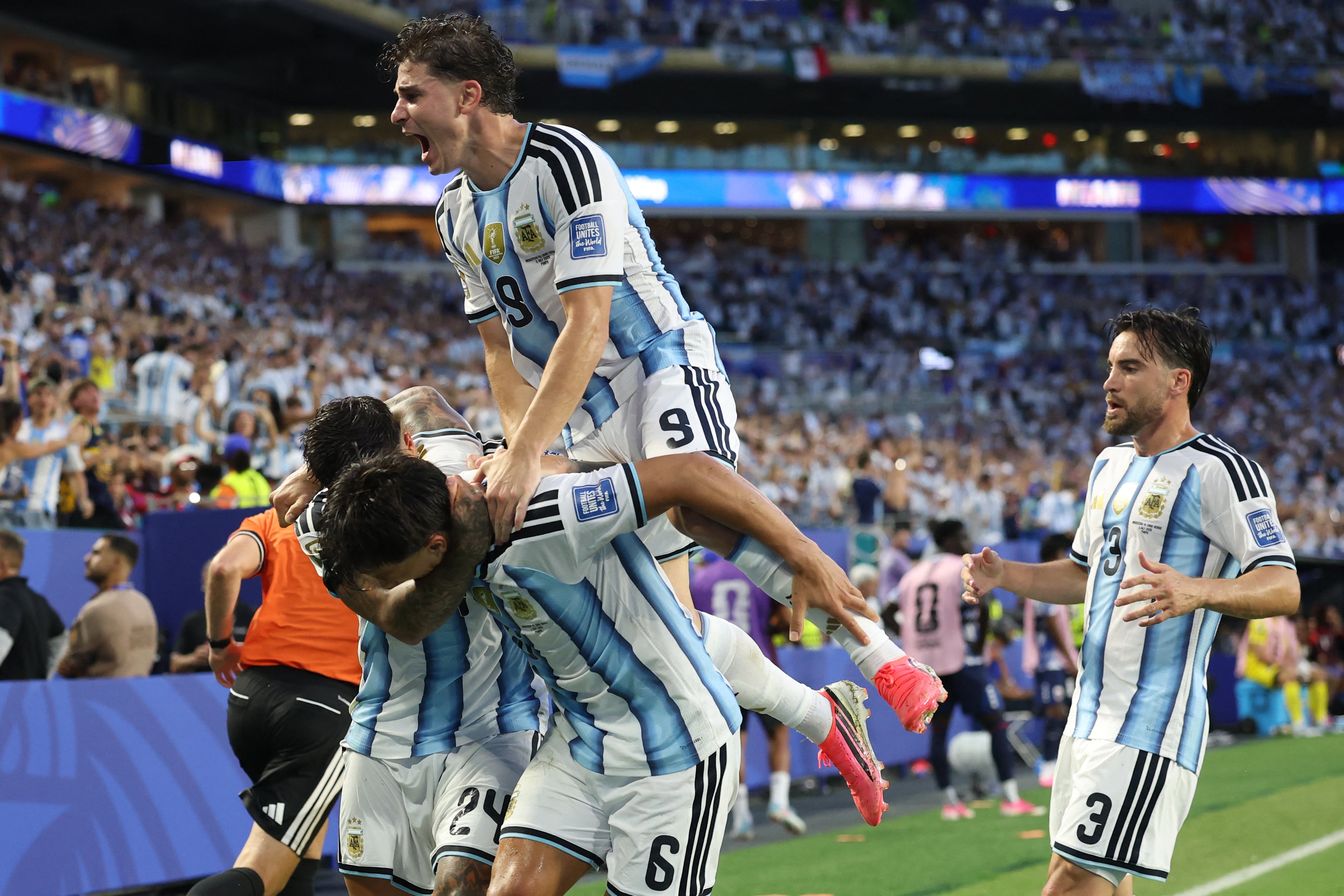 Argentina's defender #06 Lisandro Martinez celebrates with teammates scoring his team's second goal during the 2026 World Cup round of 32 football match between Argentina and Cape Verde at the Miami Stadium in Miami Gardens on July 3, 2026. (Photo by PATRICIA DE MELO MOREIRA / AFP)