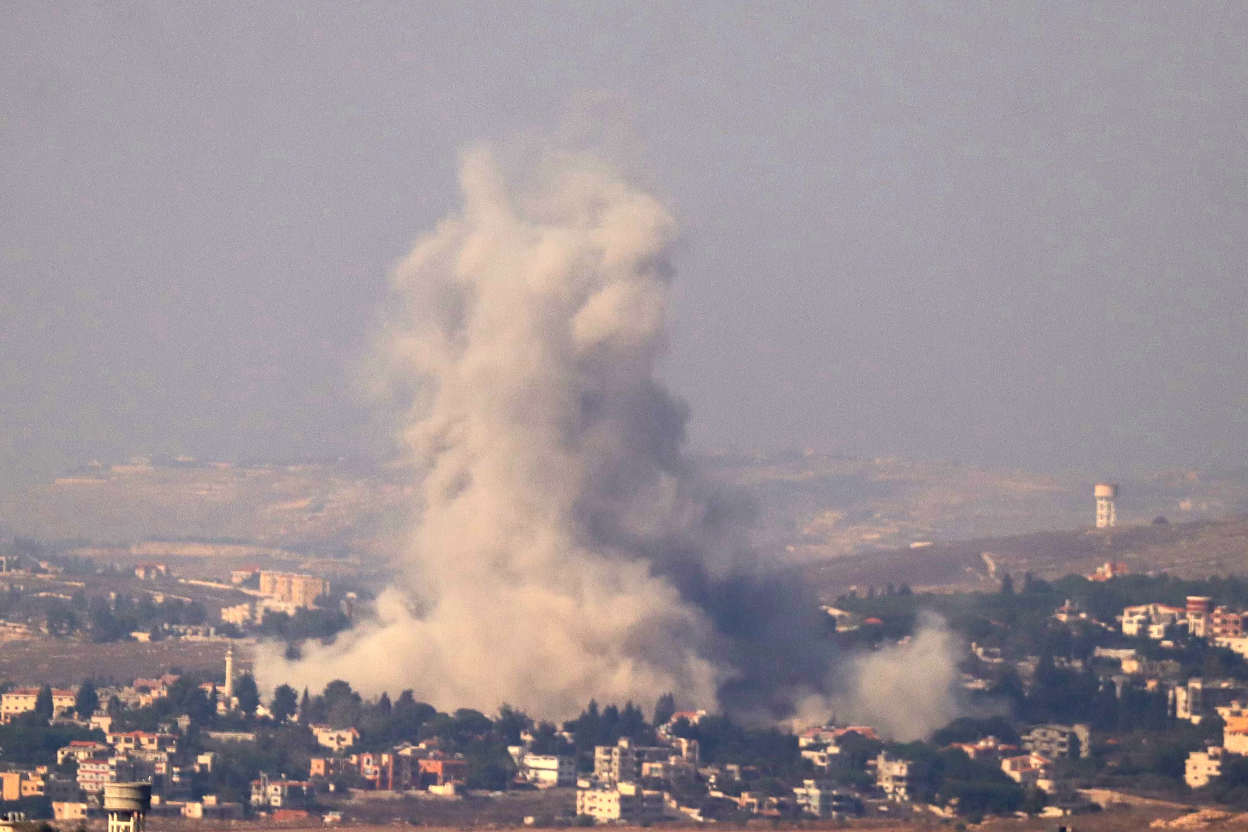 A picture taken from the Marjeyoun area shows smoke rising from the site of an Israeli airstrike that targeted the southern Lebanese village of Kfar Tibnit on October 13, 2024, amid the ongoing war between Hezbollah and Isra