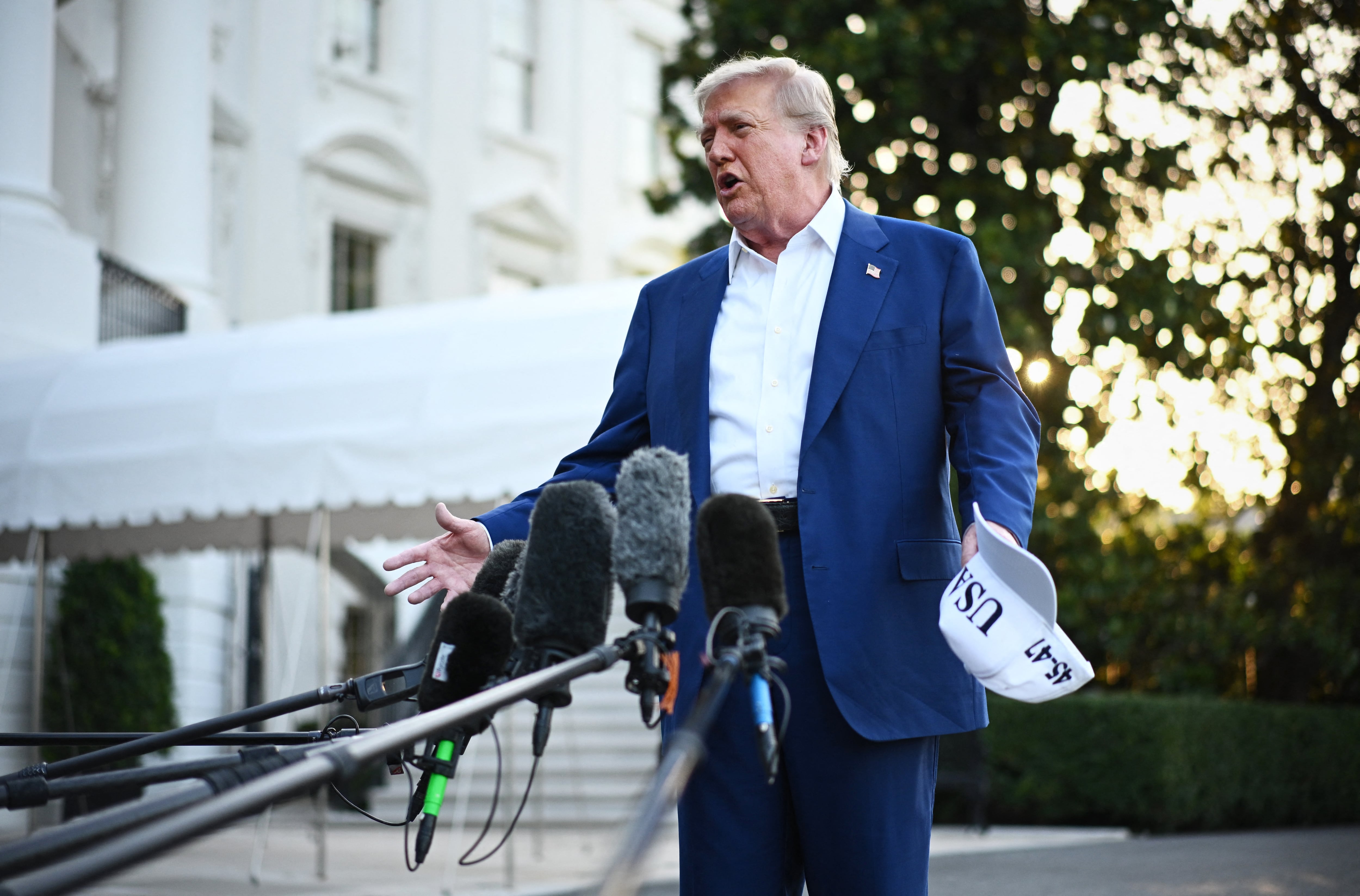 US President Donald Trump makes his way to board Marine One before departing from the South Lawn of the White House in Washington, DC on June 24, 2025, to attend the NATO's Heads of State and Government summit in The Hague. (Photo by Mandel NGAN / AFP)