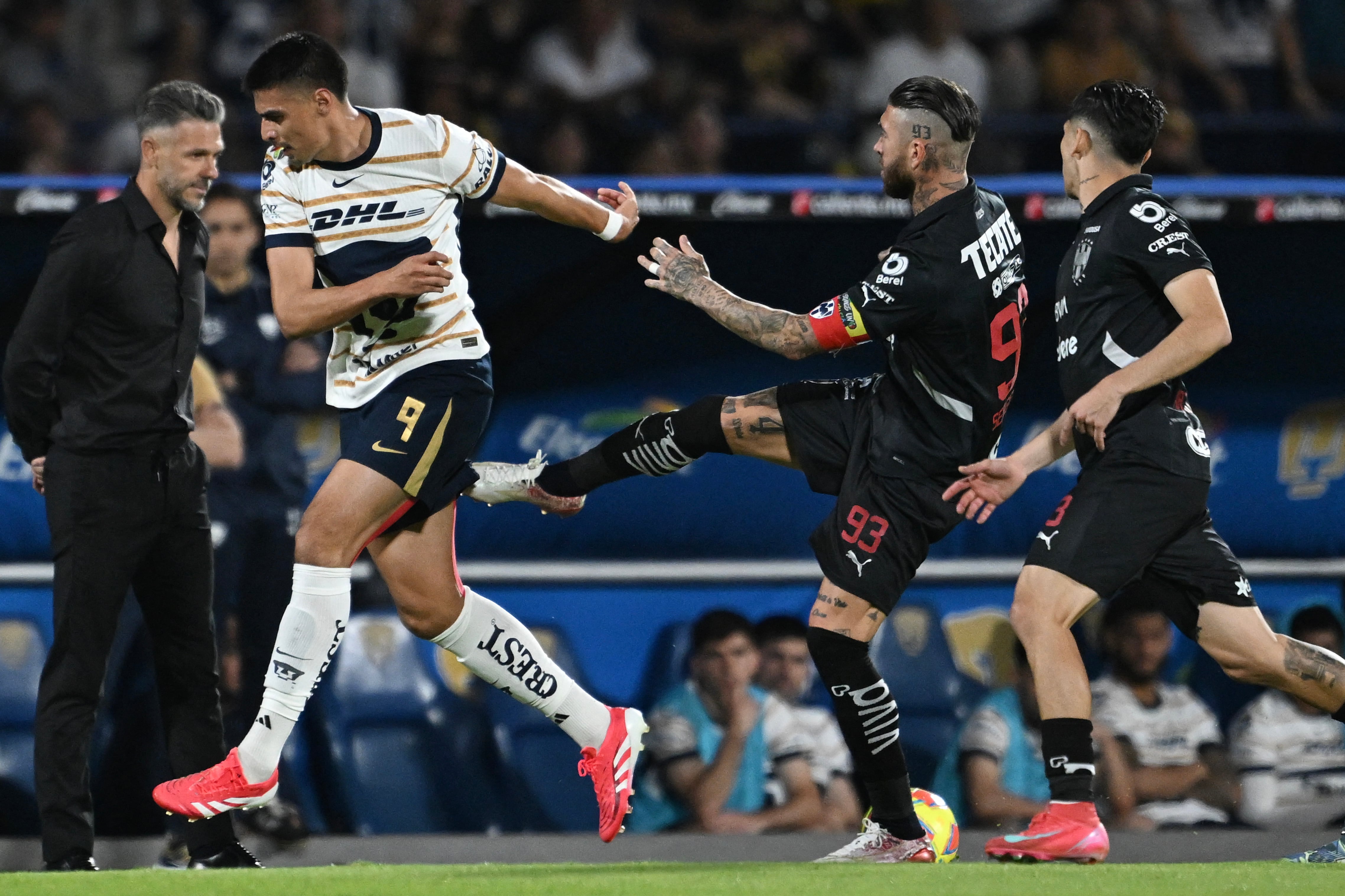 Guillermo Martinez is fouled by Monterrey's Spanish defender #93 Sergio Ramos