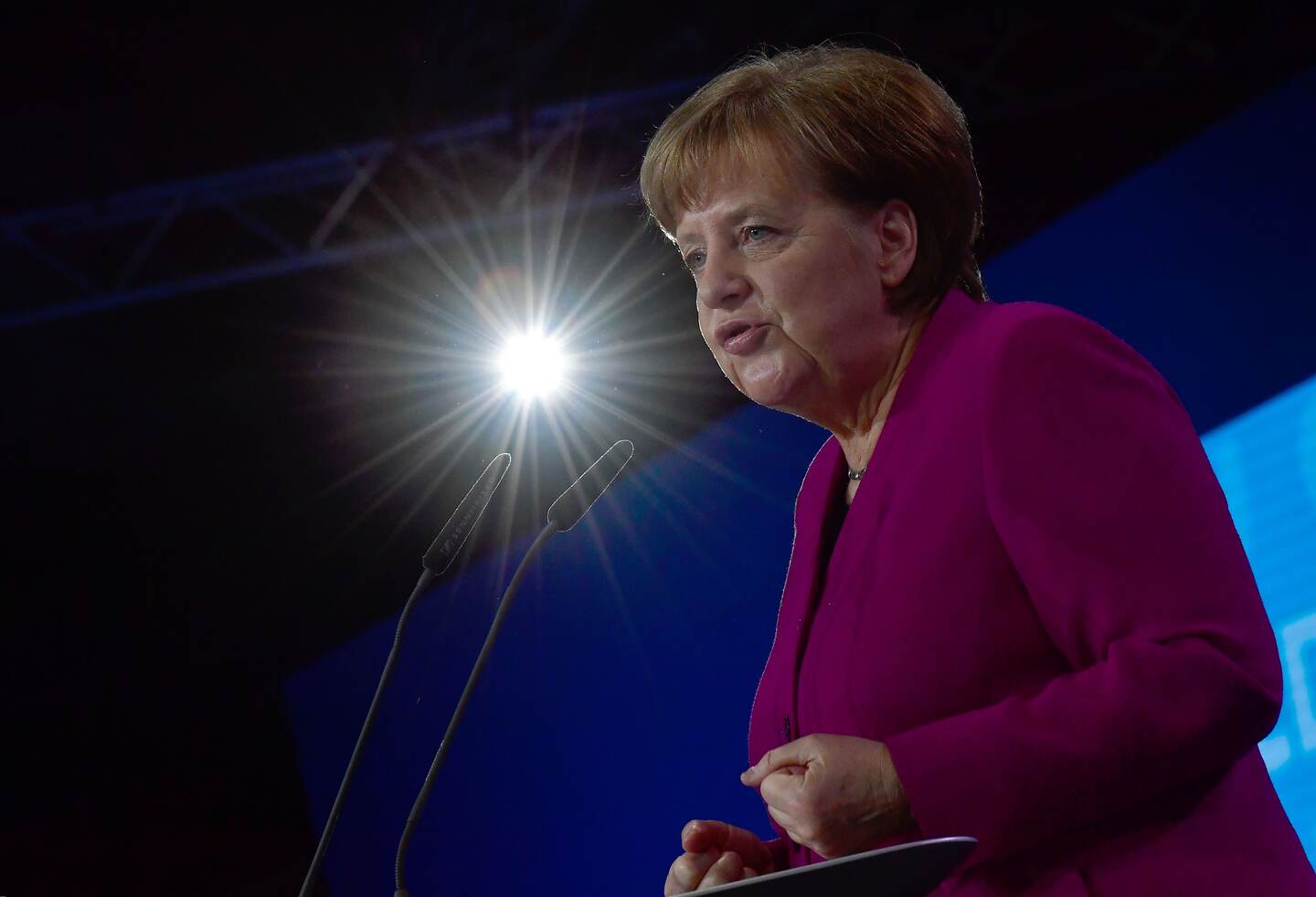 (FILES) This file photo taken on February 26, 2018 shows German Chancellor Angela Merkel as she gives a speech during her conservative Christian Democratic Union (CDU) party's congress in Berlin.
Long dubbed the "Queen of Europe", Germany's veteran Chancellor Angela Merkel emerges as the bruised survivor of her deepest crisis to govern for what many expect will be her final term. After 12 years at the helm of Europe's top economy, the pastor's daughter often called the world's most powerful woman goes on to live another day after post-war Germany's longest stretch of coalition haggling.
/ AFP PHOTO / Tobias SCHWARZ
