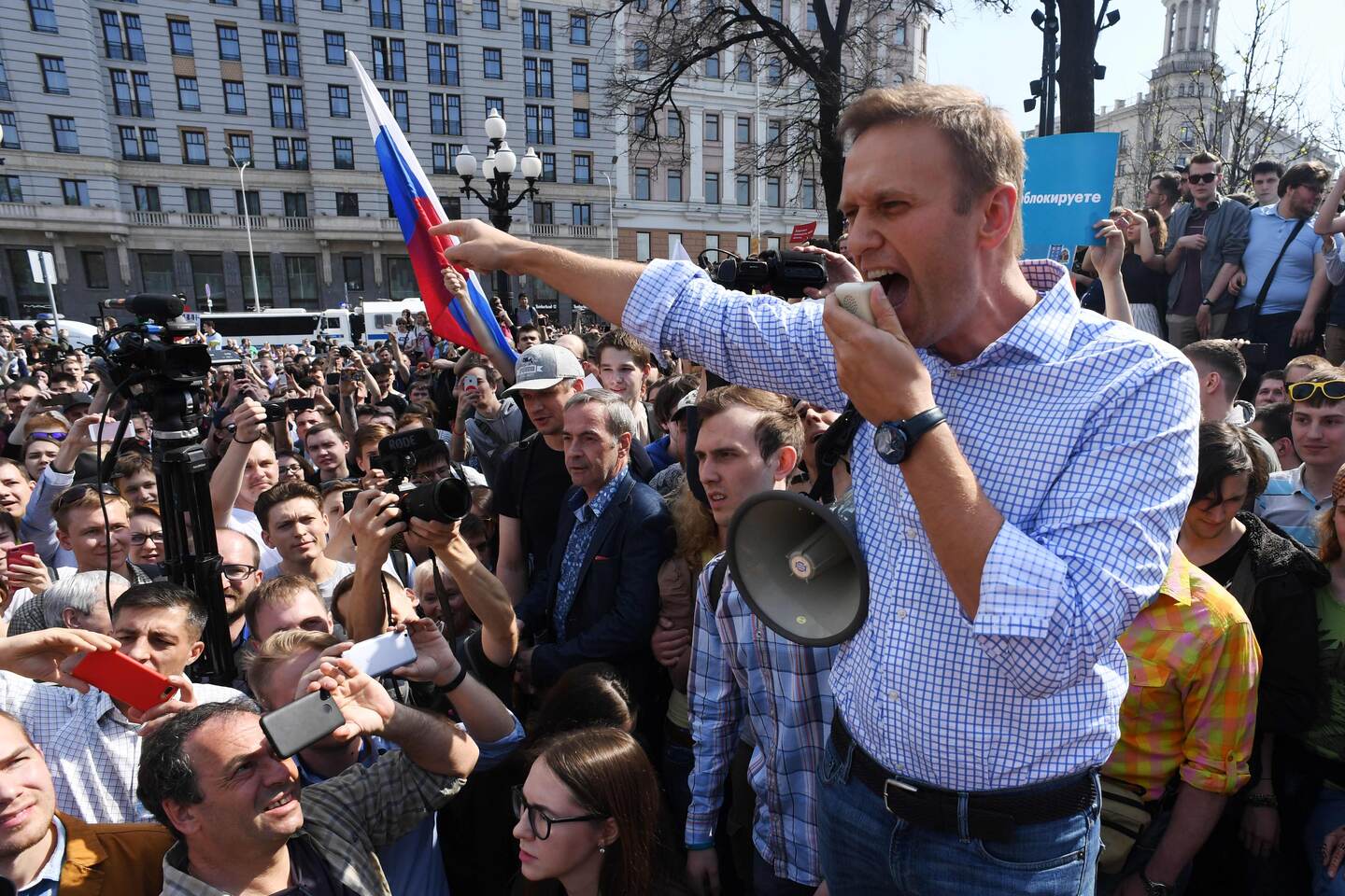 (FILES) In this file photo taken on May 05, 2018 Russian opposition leader Alexei Navalny addresses supporters during an unauthorized anti-Putin rally in Moscow, two days ahead of Vladimir Putin's inauguration for a fourth Kremlin term. - The Russian opposition leader Alexei Navalny was in intensive care in a Siberian hospital on August 20, 2020 after he fell ill in what his spokeswoman said was a suspected poisoning. (Photo by Kirill KUDRYAVTSEV / AFP)