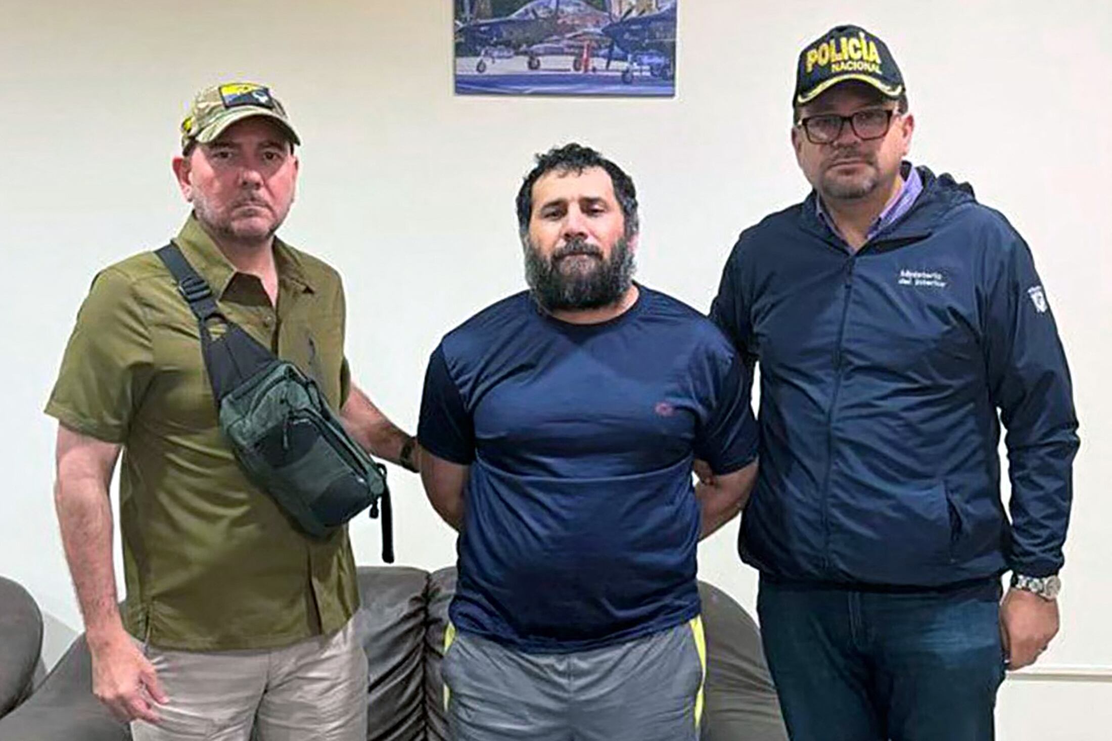 This handout picture released by the Ecuadorean Army shows drug trafficker Adolfo Macias, alias Fito, after being recaptured in Manta, Manabi Province, Ecuador, on June 25, 2025. Ecuadorian security forces recaptured fugitive "Fito," the country's most wanted drug trafficker, whose escape in January 2024 sparked an unprecedented wave of violence, President Daniel Noboa reported on June 25. (Photo by Handout / Ecuadorean Army / AFP) / RESTRICTED TO EDITORIAL USE - MANDATORY CREDIT "AFP PHOTO / ECUADOREAN ARMY" - NO MARKETING NO ADVERTISING CAMPAIGNS - DISTRIBUTED AS A SERVICE TO CLIENTS