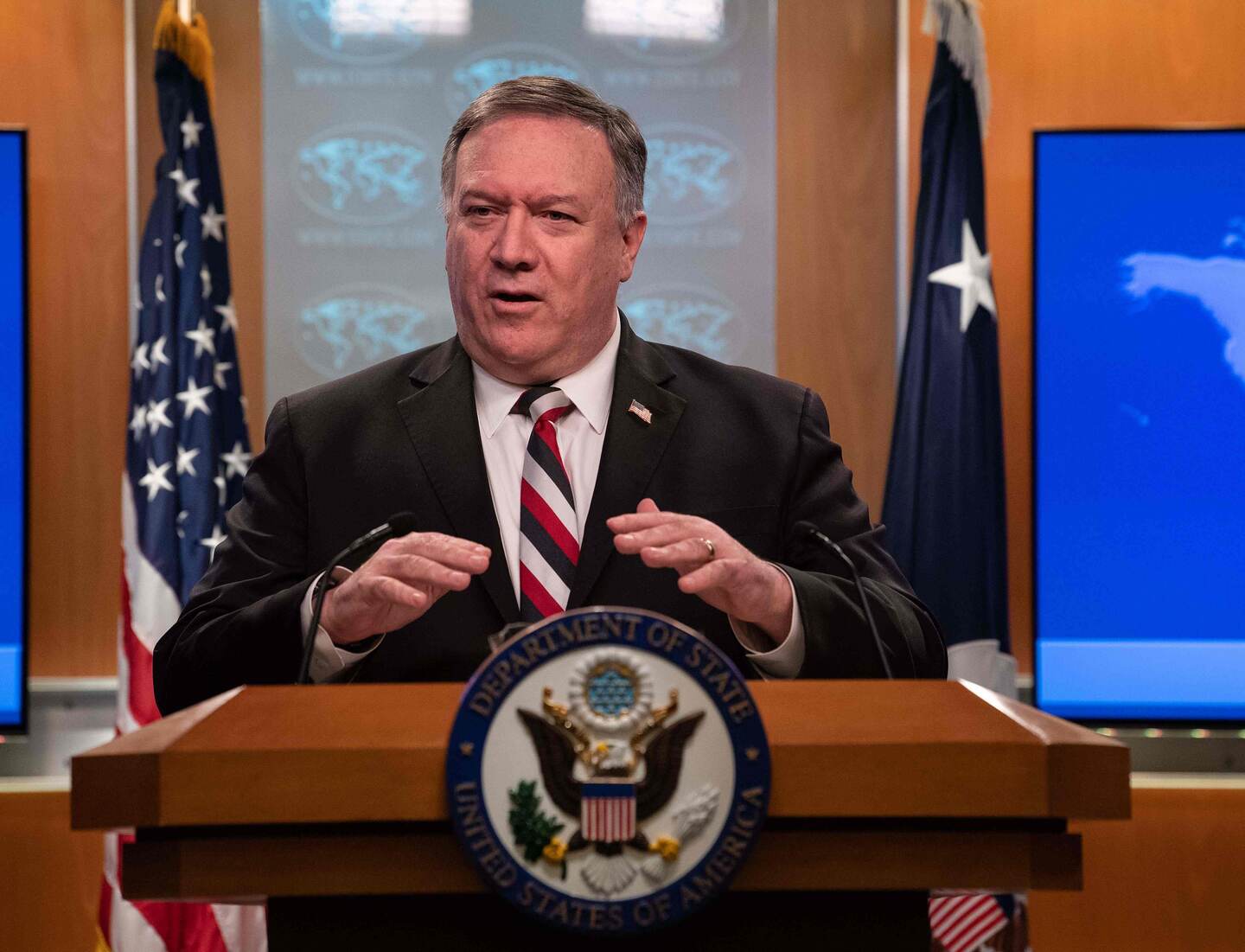(FILES) In this file photo taken on March 17, 2020 US Secretary of State Mike Pompeo speaks at a press conference at the State Department in Washington DC. - US Secretary of State Mike Pompeo said January 11, 2021 he was placing Cuba back on a blacklist of state sponsors of terrorism, a last-minute roadblock to efforts by President-elect Joe Biden's to ease tensions. (Photo by NICHOLAS KAMM / AFP)