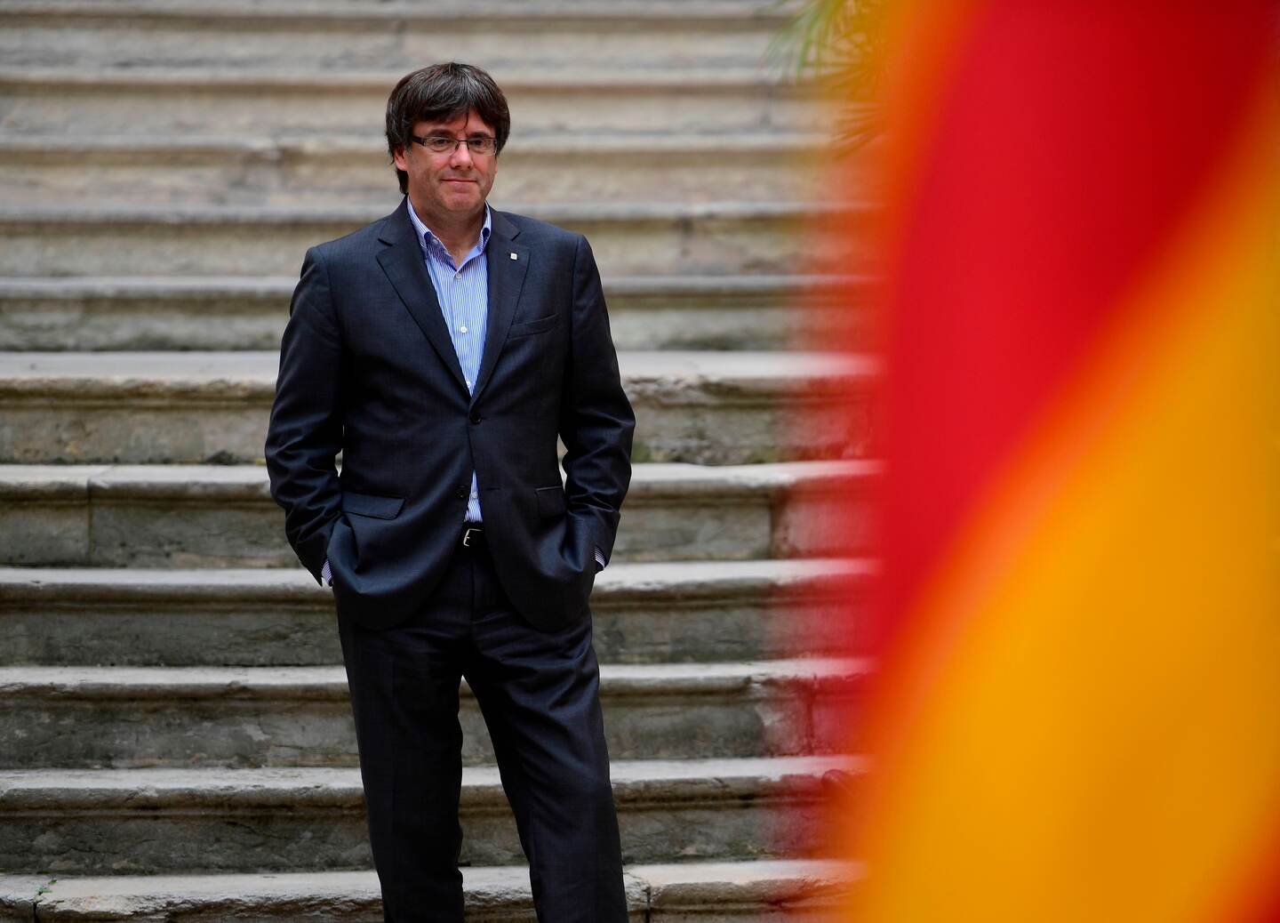 (FILES) This file photo taken on September 30, 2017 shows
Catalan president Carles Puigdemont posing before an AFP interview in Girona on September 30, 2017.
Catalonia's sacked separatist leader Carles Puigdemont was under pressure on January 28, 2018 to return to Spain if he wants to form a new government after the country's top court ruled he could not govern the region from abroad. Puigdemont, who fled to Belgium in October after the Catalan parliament declared independence, would shortly ask the Supreme Court for permission to attend a debate and vote in the regional parliament on Tuesday, a lawmaker with his Together for Catalonia party, Josep Rull, told Catalan radio.
/ AFP PHOTO / PIERRE-PHILIPPE MARCOU / TO GO WITH AFP INTERVIEW by DANIEL BOSQUE