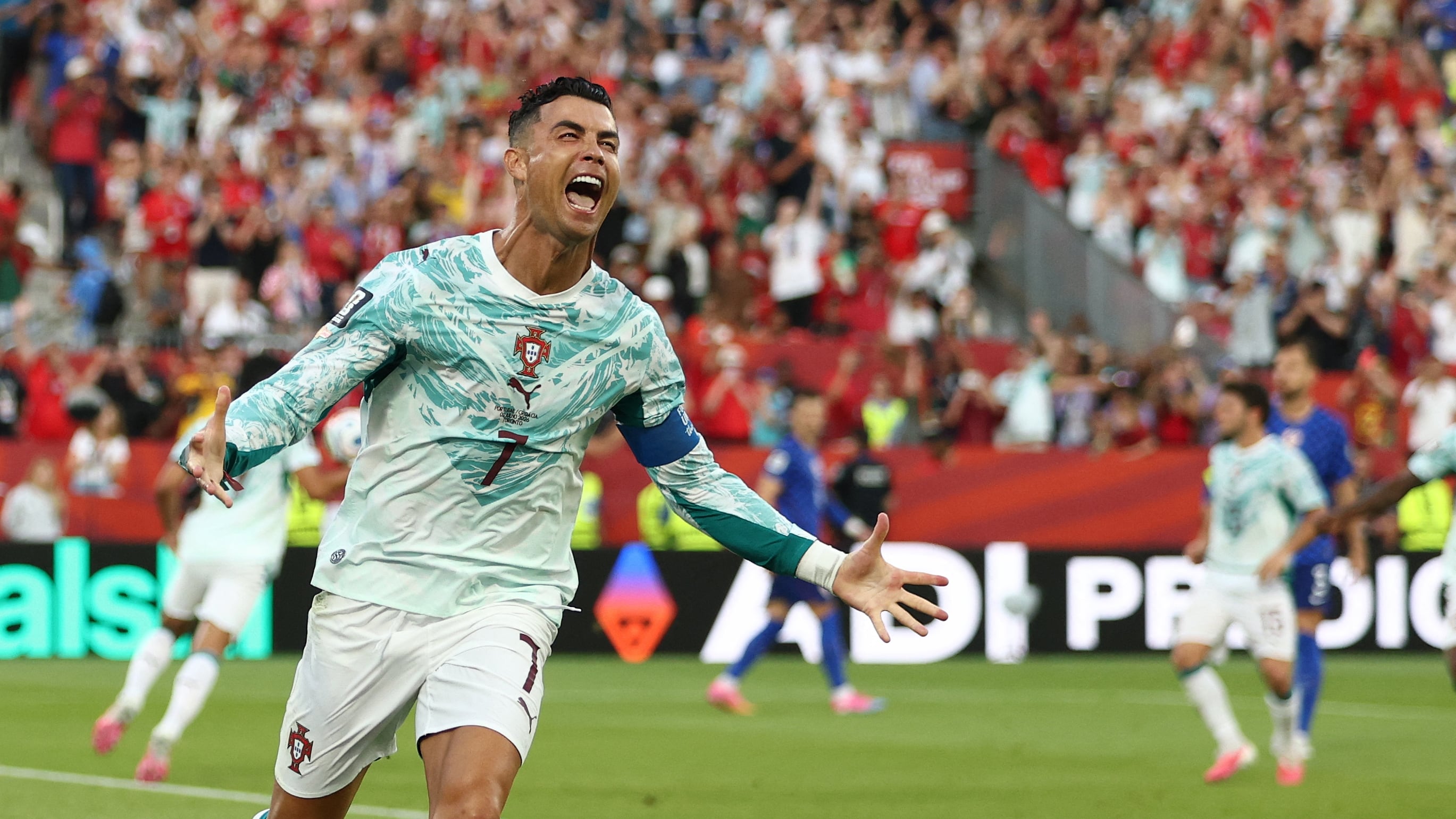 Portugal's forward #07 Cristiano Ronaldo celebrates after scoring his team's first goal from the penalty spot during the 2026 World Cup round of 32 football match between Portugal and Croatia at the Toronto Stadium in Toronto on July 2, 2026. (Photo by Cole Burston / AFP)