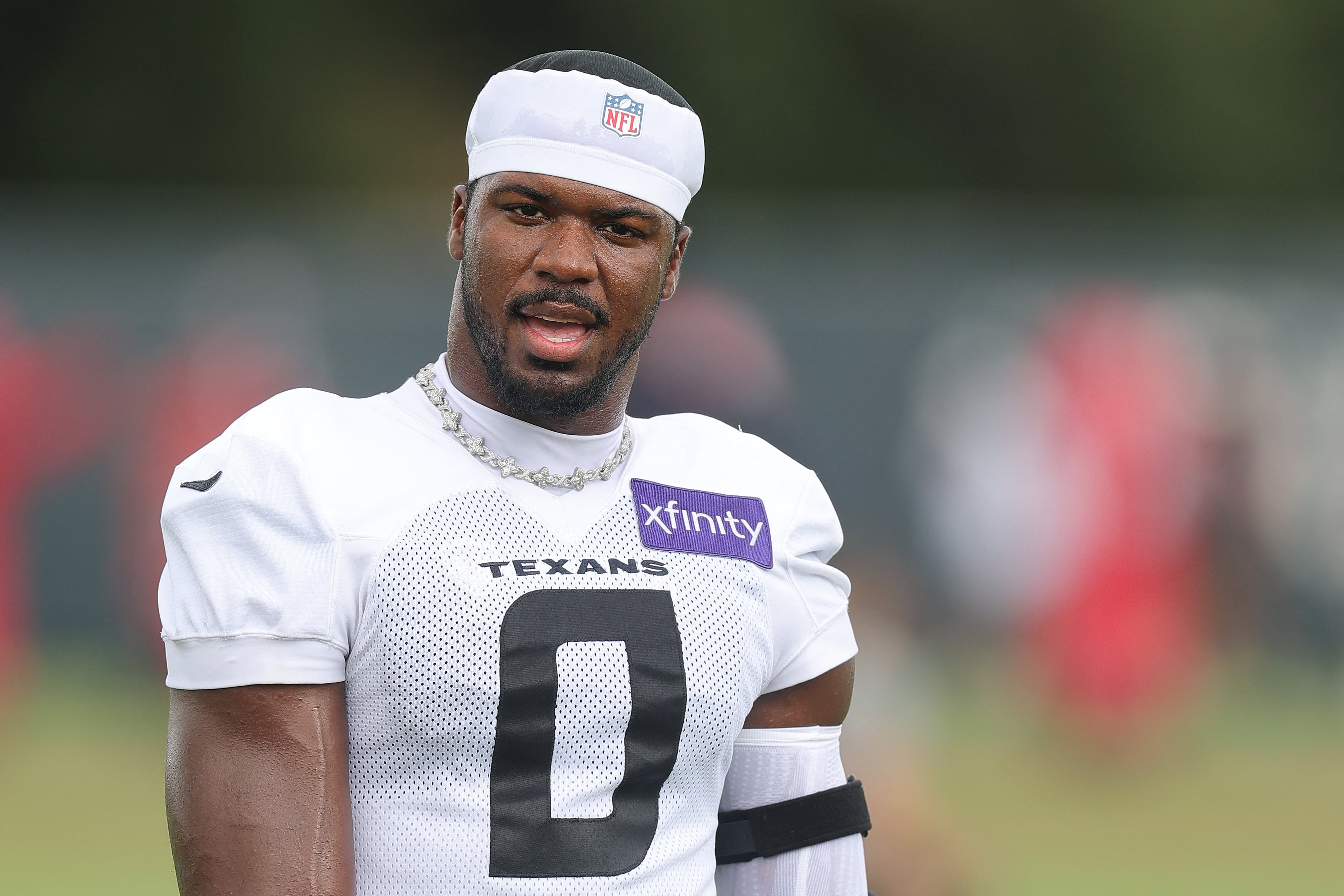 HOUSTON, TEXAS - AUGUST 01: Azeez al-Shaair #0 of the Houston Texans looks on during Houston Texans training camp at Houston Methodist Training Center