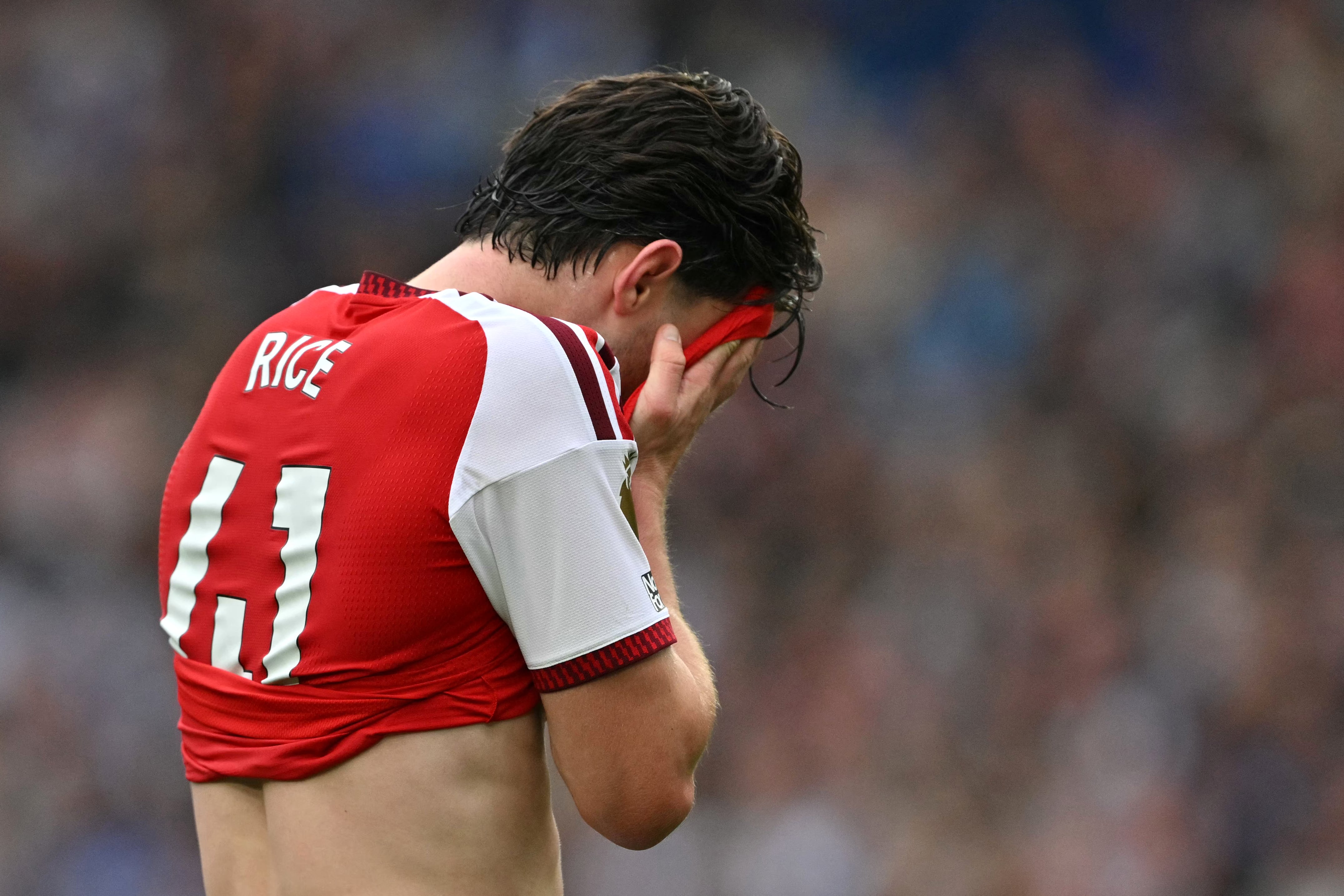 Arsenal's English midfielder #41 Declan Rice reacts during the English Premier League football match between Brighton and Hove Albion and Arsenal at the American Express Community Stadium in Brighton, southern England on September 19, 2026. (Photo by Glyn KIRK / AFP) / RESTRICTED TO EDITORIAL USE. No use with unauthorized audio, video, data, fixture lists, club/league logos or 'live' services. Online in-match use limited to 120 images. An additional 40 images may be used in extra time. No video emulation. Social media in-match use limited to 120 images. An additional 40 images may be used in extra time. No use in betting publications, games or single club/league/player publications. /