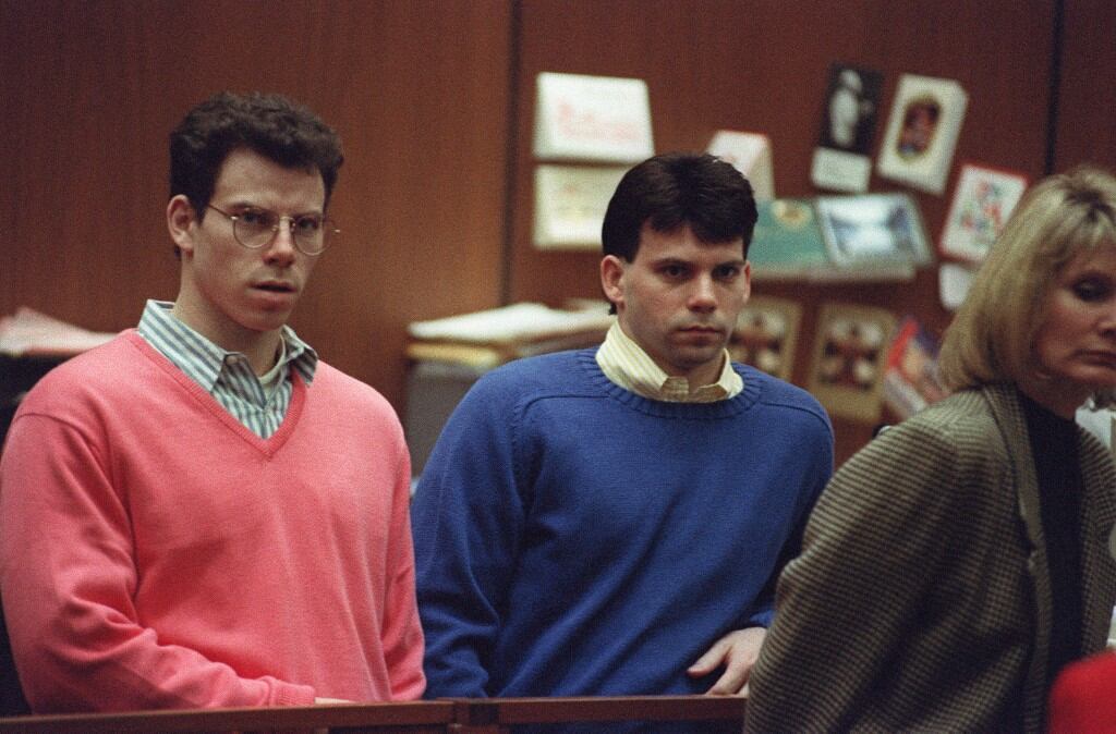 (FILES) Erik Menendez (L) and his brother Lyle (R) listen during a pre-trial hearing, on December 29, 1992 in Los Angeles. The chief prosecutor in Los Angeles will oppose an attempt by Erik and Lyle Menendez to get a new trial for the bloody 1989 murder of their wealthy parents, he said February 21.
The pair were jailed for life after a blockbuster legal drama in the 1990s detailing the gruesome slayings of Jose and Kitty Menendez at the family's luxury Beverly Hills mansion. (Photo by VINCE BUCCI / AFP)