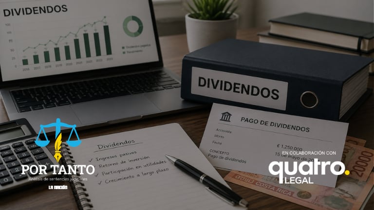 en la imagen un escritorio con cosas y papeles alusivos a dividendos