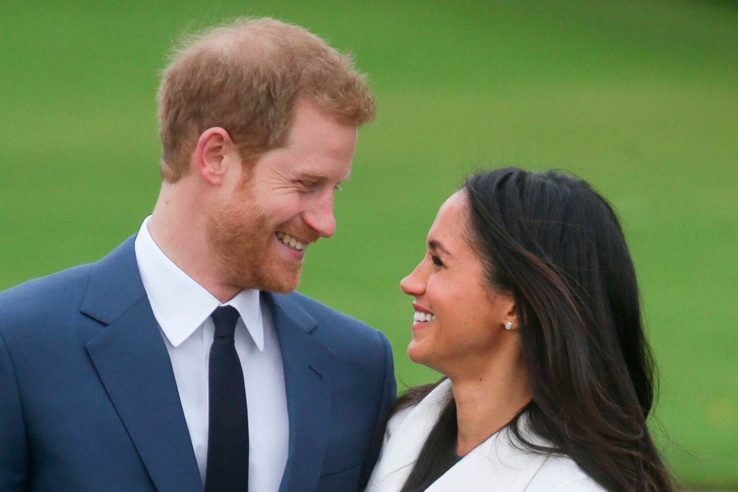(FILES) In this file photo taken on November 27, 2017 Britain's Prince Harry and his fianc�e US actress Meghan Markle pose for a photograph in the Sunken Garden at Kensington Palace in west London on November 27, 2017, following the announcement of their engagement.
Prince Harry, who marries US former actress Meghan Markle on May 19, 2018 has been transformed in recent years from an angry young man into one of the British royal family's greatest assets. / AFP PHOTO / Daniel LEAL-OLIVAS