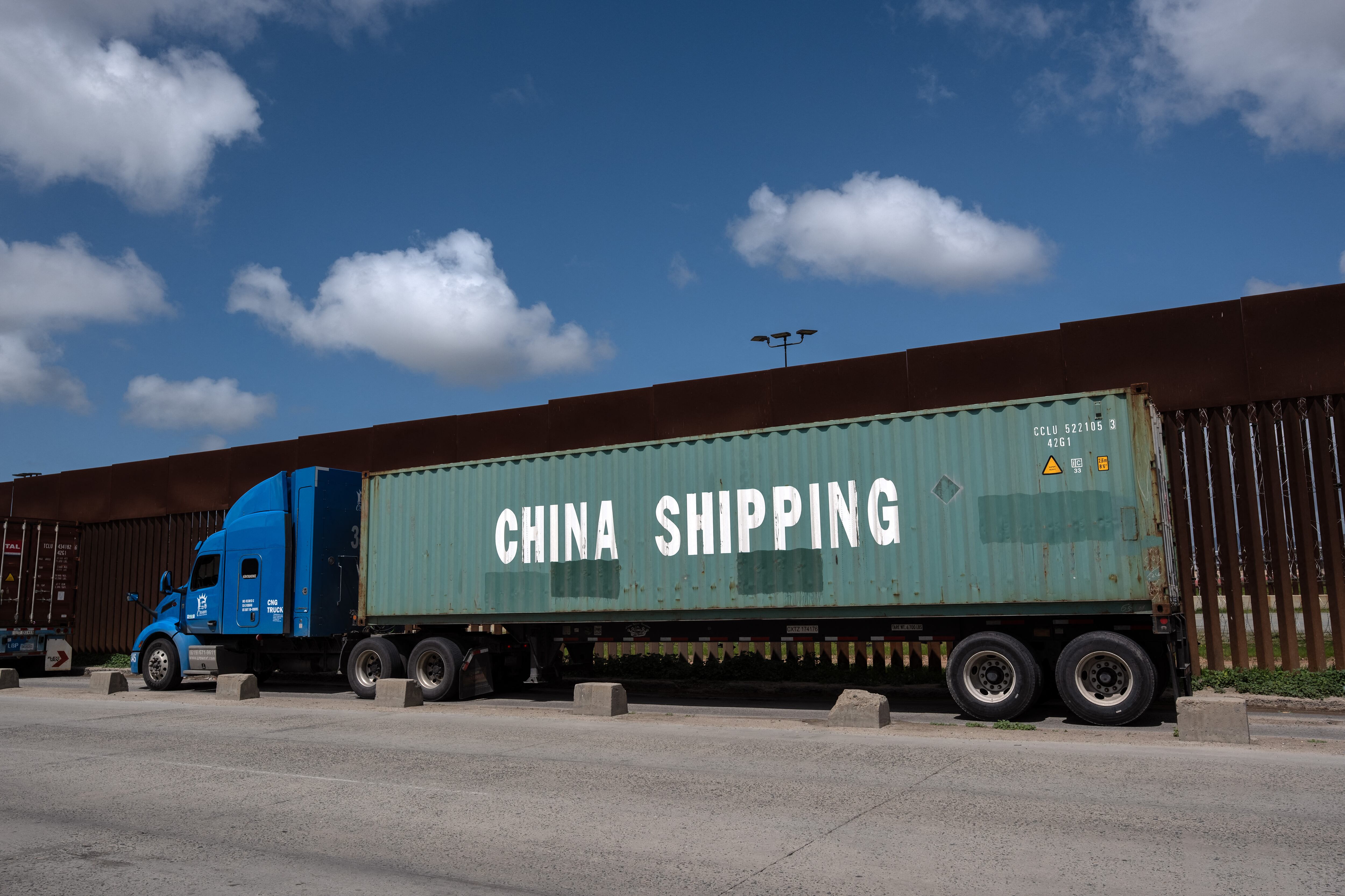 Trucks coming from Mexico enter the United States to an inspection station after crossing the border in Otay Mesa, California, on April 1, 2025. US President Donald Trump kept the world's leading economies on edge on April 1, 2025 as he made final preparations for a "Liberation Day" announcement of sweeping new tariffs that could trigger a global trade war. Trump has promised to be "very kind" when he unveils the so-called reciprocal tariffs on Wednesday, but uncertainty reigned over which countries would be targeted and by how much. (Photo by SANDY HUFFAKER / AFP)