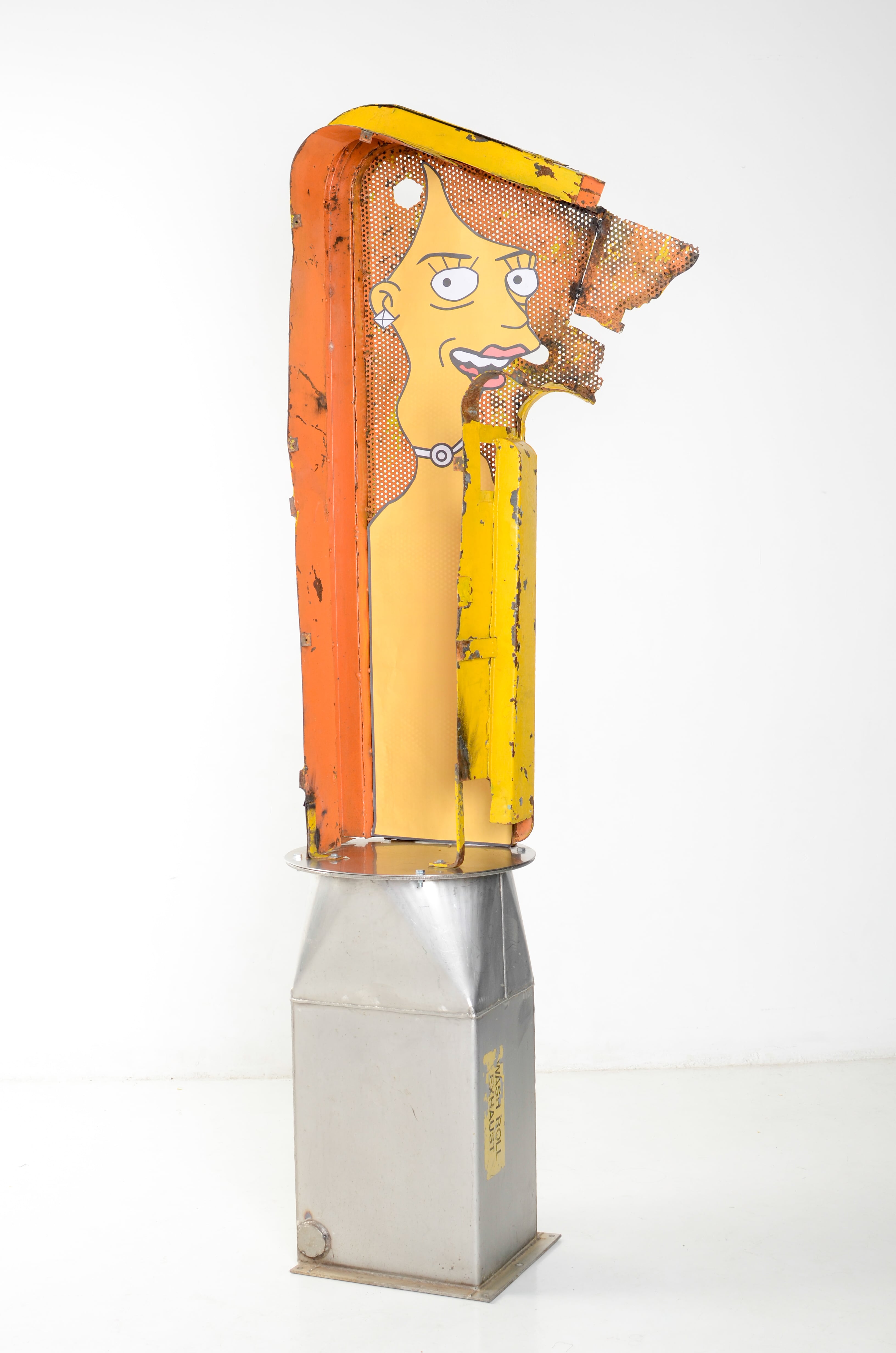 'Marge – Tica', 2015. Serie 'Personajes'
Ensamble con desechos industriales e impresión digital, 212 x 45 x 45 cm, de Montserrat Mesalles V.