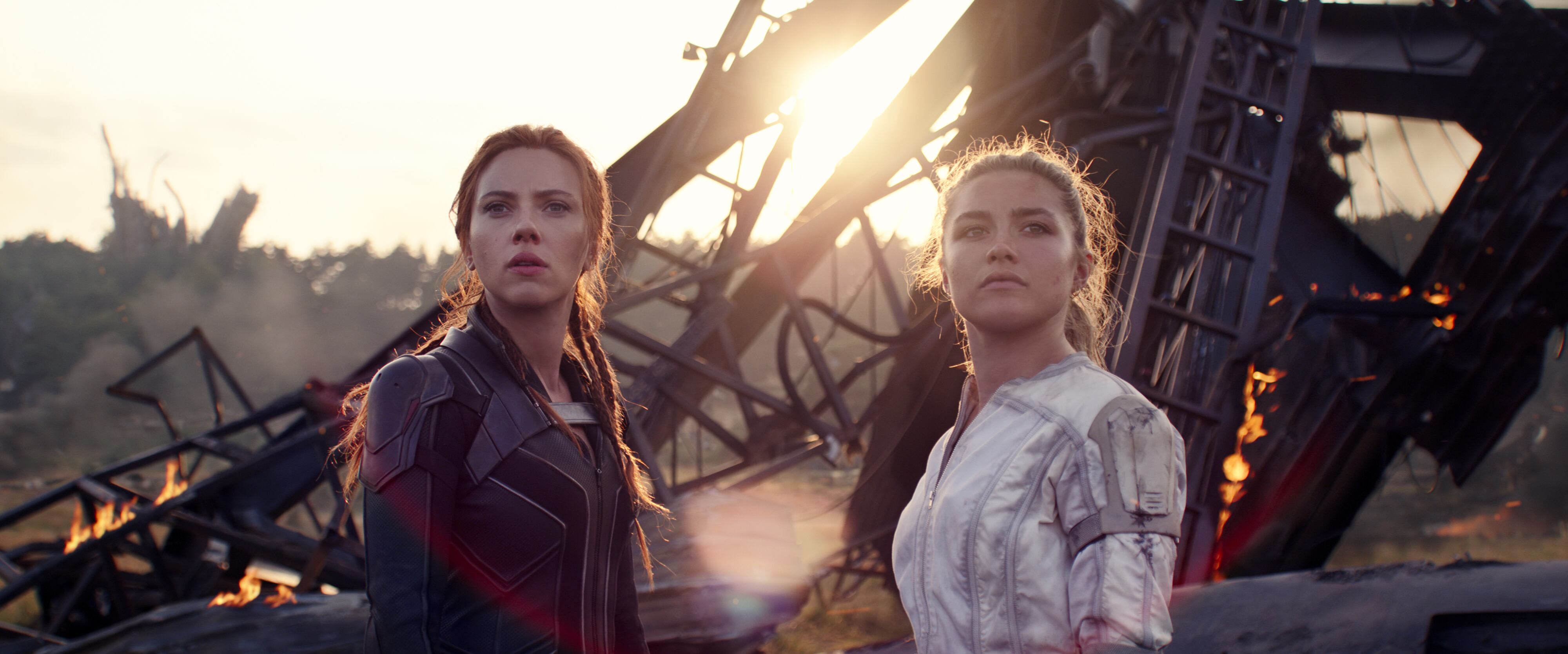 (L-R): Black Widow/Natasha Romanoff (Scarlett Johansson) and Yelena (Florence Pugh) in Marvel Studios' BLACK WIDOW, in theaters and on Disney+ with Premier Access. Photo courtesy of Marvel Studios. ©Marvel Studios 2021. All Rights Reserved.