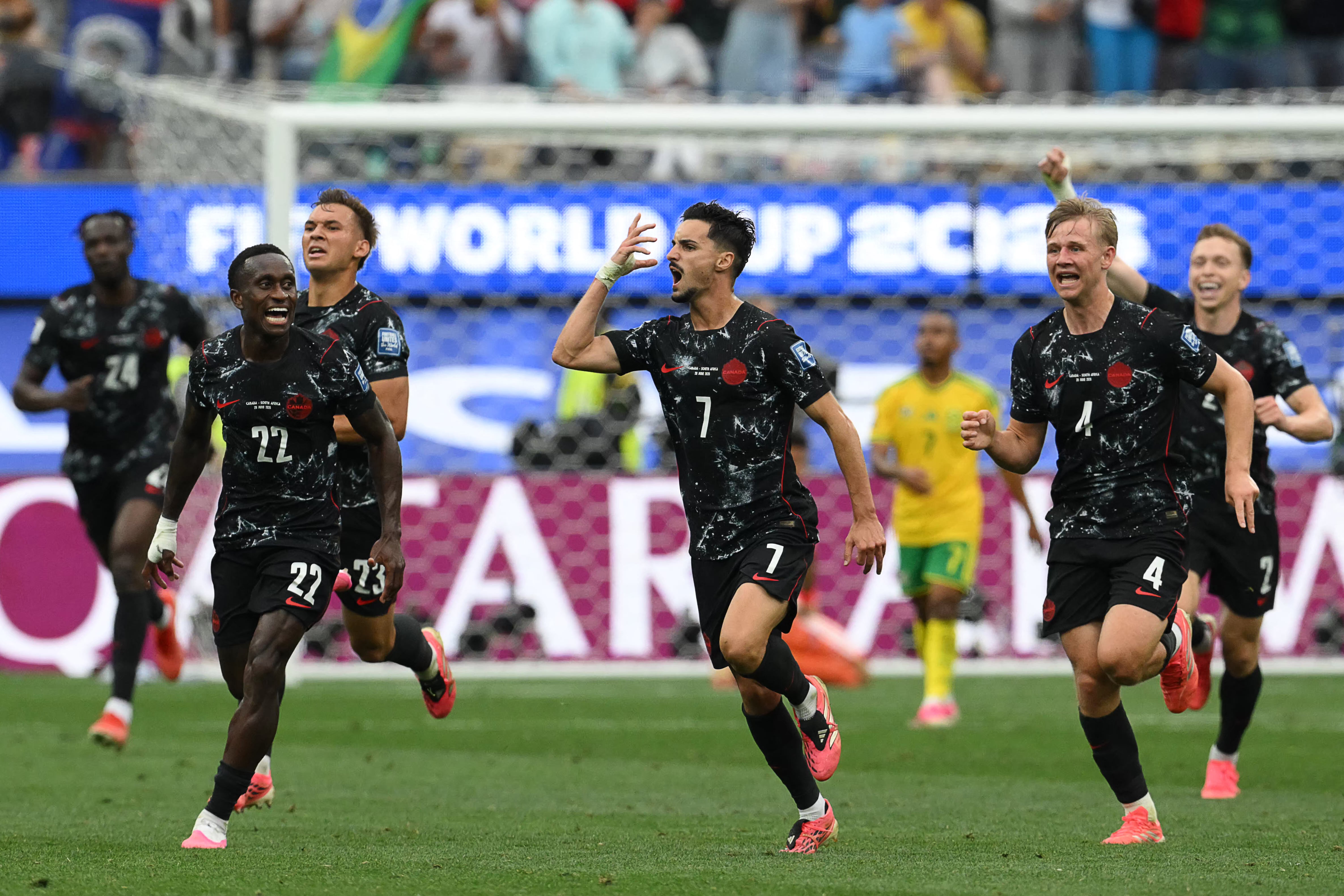 Canada's midfielder #07 Stephen Eustaquio celebrates scoring his team's first goal during the 2026 World Cup round of 32 football match between South Africa and Canada at the Los Angeles Stadium in Inglewood on June 28, 2026. (Photo by Patrick T. Fallon / AFP)