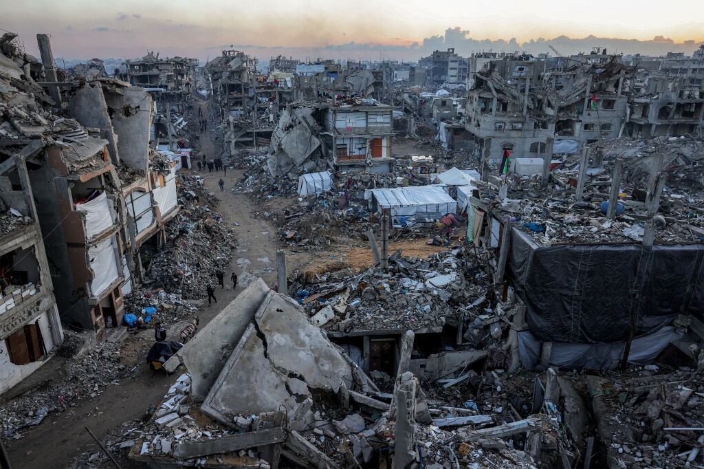 Destroyed buildings are pictured in Jabalia in the northern Gaza Strip on the first day of the Muslim holy fasting month of Ramadan on March 1, 2025 amid the ongoing truce in the war between Israel and Hamas. (Photo by Bashar TALEB / AFP)