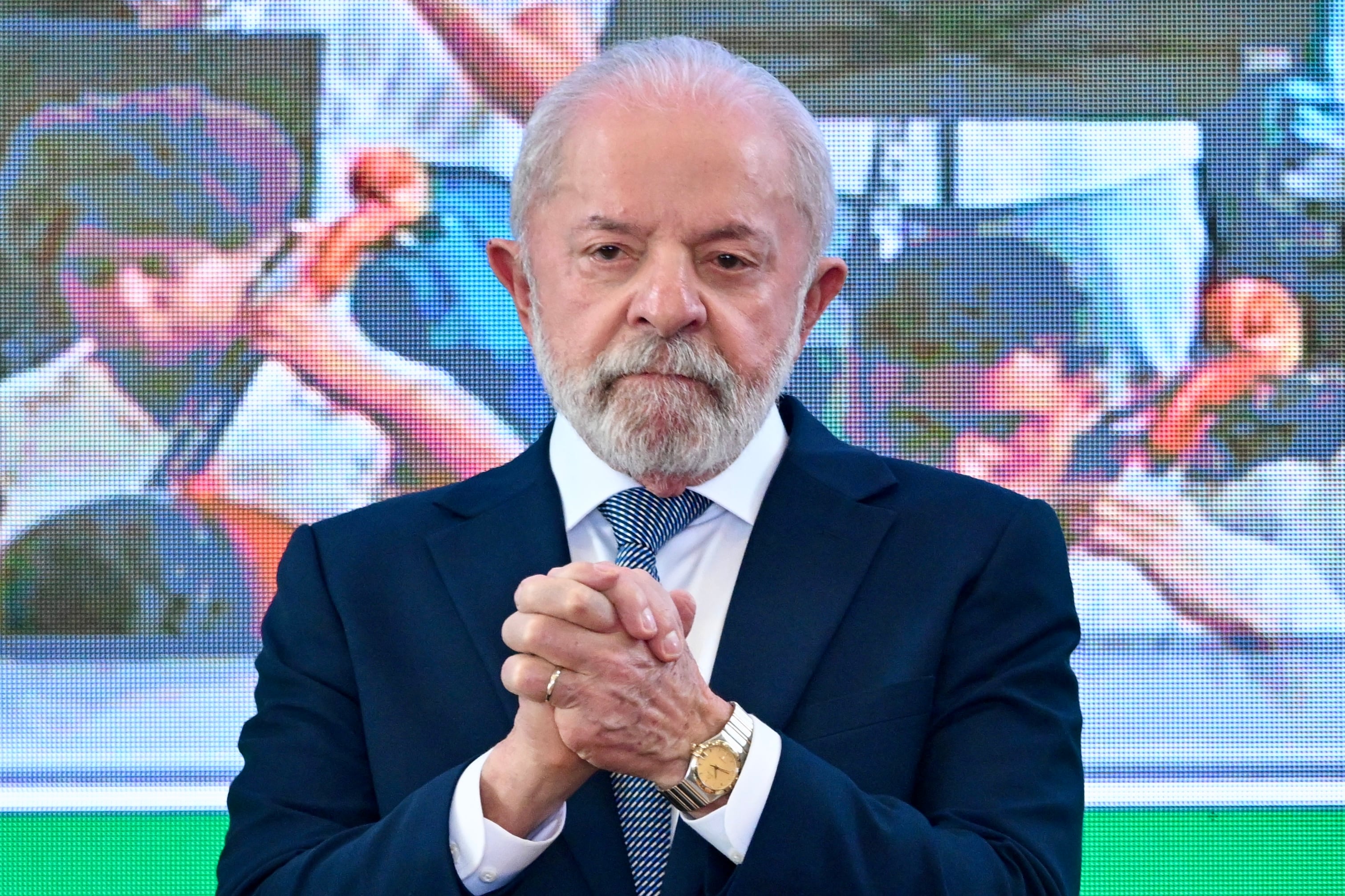 Brazil's President Luiz Inacio Lula da Silva gestures during the meeting of the Council for Sustainable Economic and Social Development in Brasilia on August 5, 2025. (Photo by EVARISTO SA / AFP)