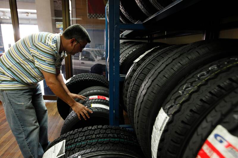 La empresa Bridgestone es una de las afectadas por la actuación de El Salvador ante lo negociado por los países del TLC. | ARCHIVO/JORGE ARCE