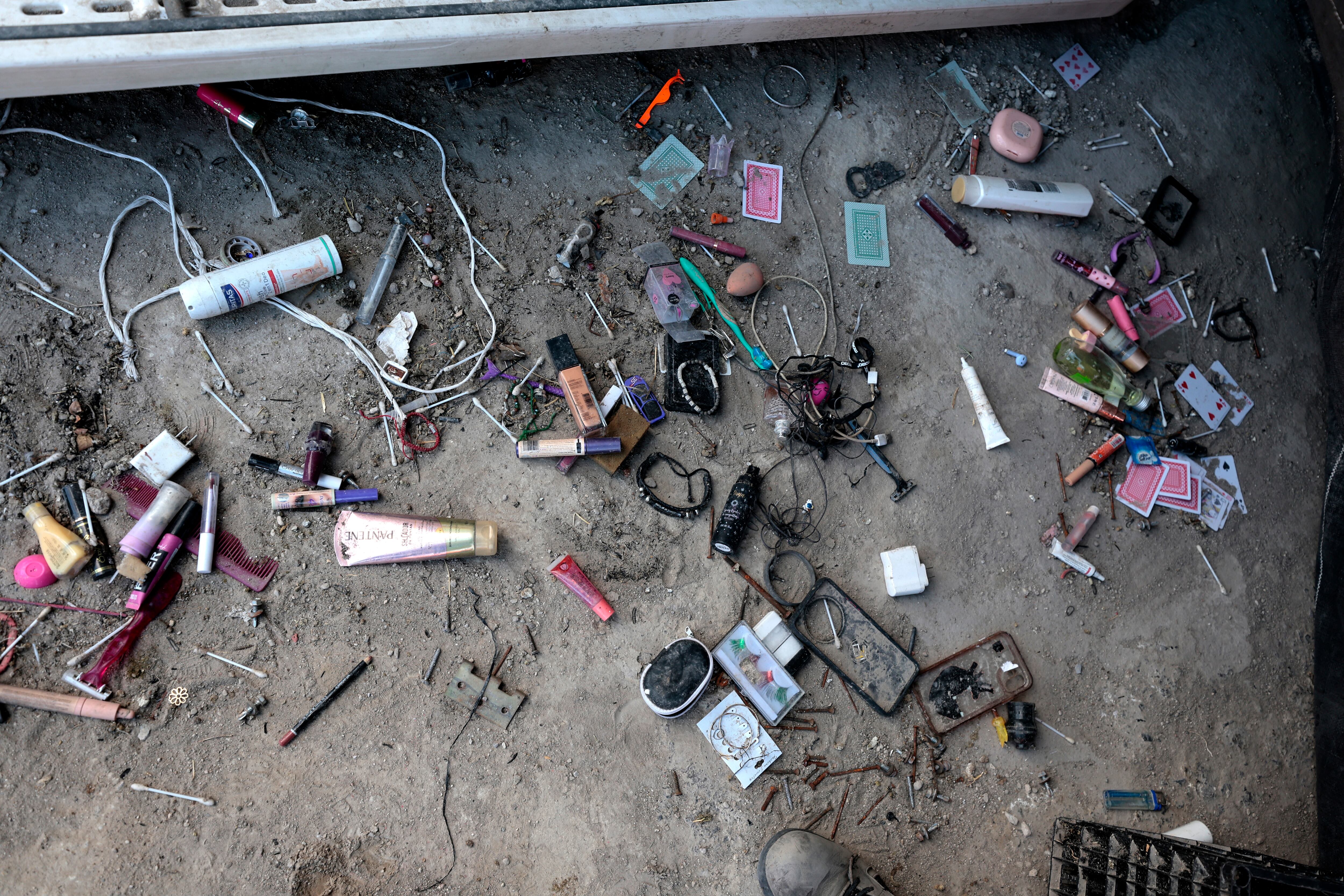 Personal belongings are seen at the Izaguirre Ranch in the community of La Estanzuela, where the collective 'Guerreros Buscadores' located three human crematoriums while searching for their relatives in Teuchitlan, Jalisco state