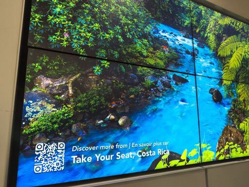 todos los pasajeros y turistas que ingresen a Canadá por el Aeropuerto Toronto Pearson podrán deleitarse con la instalación de arte  “Take Your Seat”, mientras ven biodiversidad y los atractivos turísticos de Costa Rica en muestra de fotografías. Toronto.