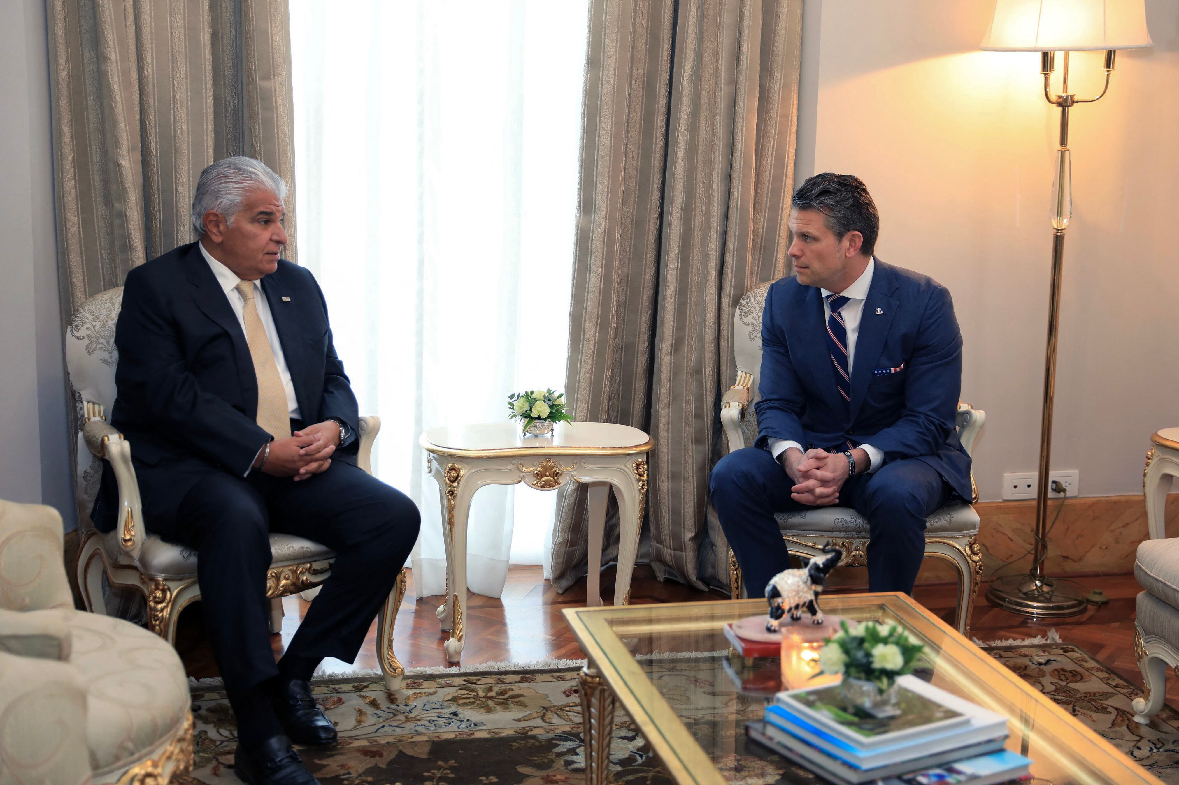 Handout picture released by Panama's Presidency showing Panama's President Jose Raul Mulino (L) holding a meeting with US Secretary of Defense Pete Hegseth at Las Garzas Presidential Palace in Panama City on April 8, 2025. Hegseth said Tuesday in Panama that Donald Trump's government "will not allow" China to "jeopardise" the operation of the interoceanic canal. (Photo by Handout / Panamanian Presidency / AFP) / RESTRICTED TO EDITORIAL USE - MANDATORY CREDIT "AFP PHOTO / PANAMA'S PRESIDENCY" - NO MARKETING NO ADVERTISING CAMPAIGNS - DISTRIBUTED AS A SERVICE TO CLIENTS