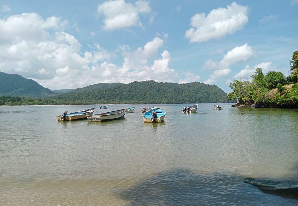 Boats are pictured on the shore of La Cueva Bay, north coast of Trinidad and Tobago, on October 16, 2025.