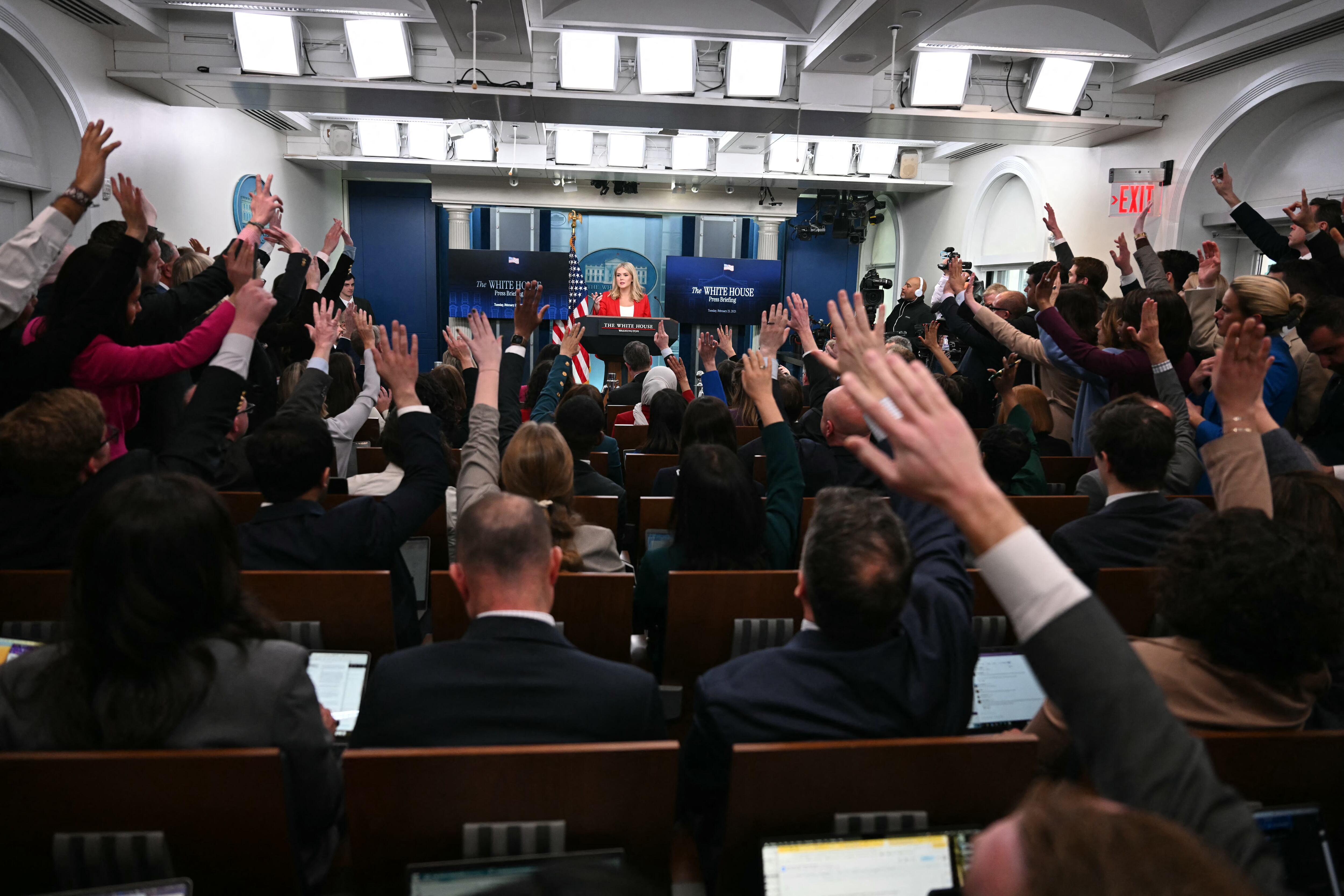 White House Press Secretary Karoline Leavitt (C) takes questions during the daily briefing in the Brady Briefing Room of the White House in Washington, DC, on February 25, 2025. (Photo by Jim WATSON / AFP)