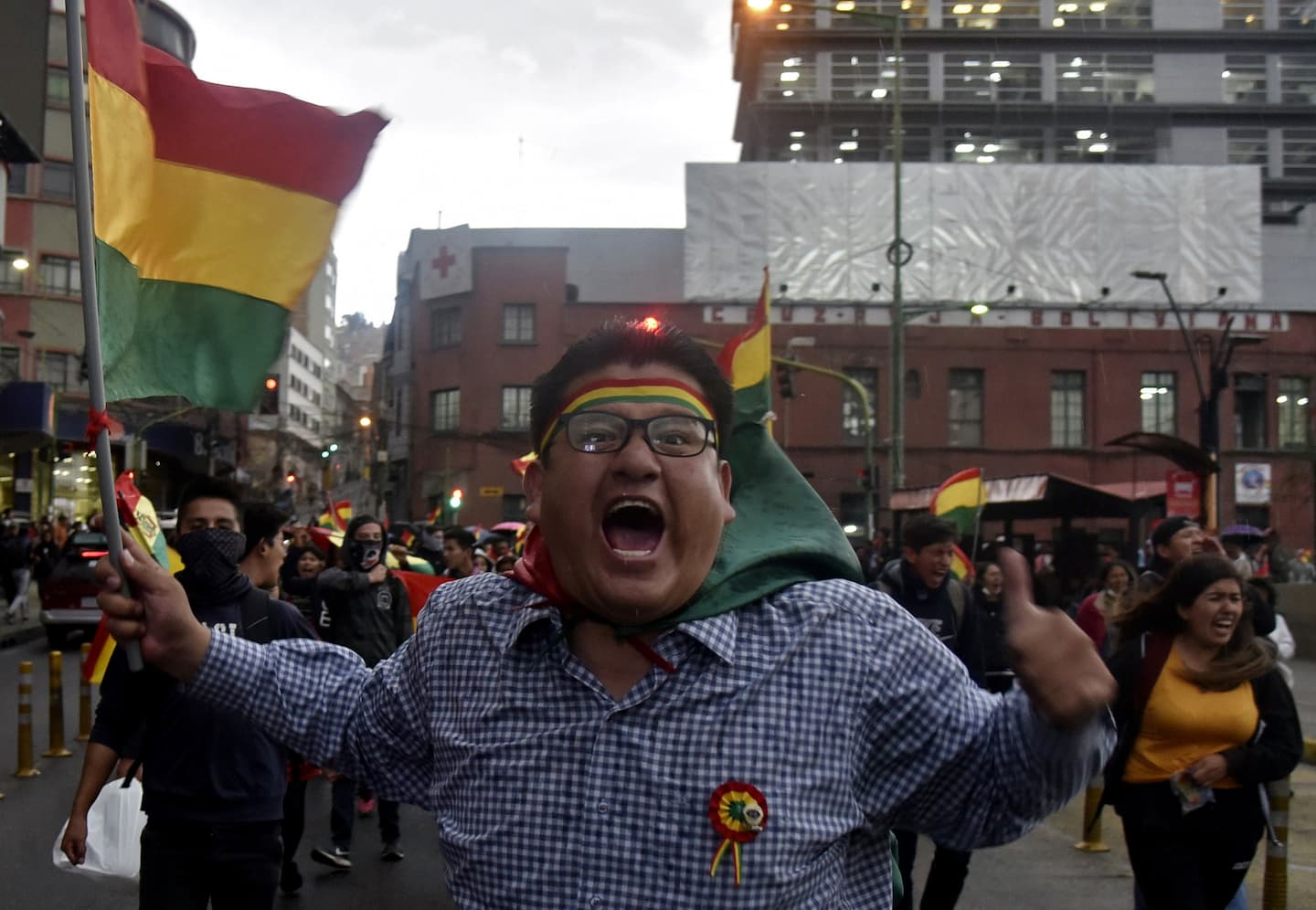 University students march against the results of last Sunday's election in La Paz on October 25, 2019. - Bolivia's electoral tribunal concluded its count of general election votes on Friday and confirmed the controversial re-election of President Evo Morales with 47,08% against 36,51% for the candidate of Comunidad Ciudadana (CC) Carlos Mesa, discarding a runoff election despite opposition accusations of fraud. (Photo by AIZAR RALDES / AFP)