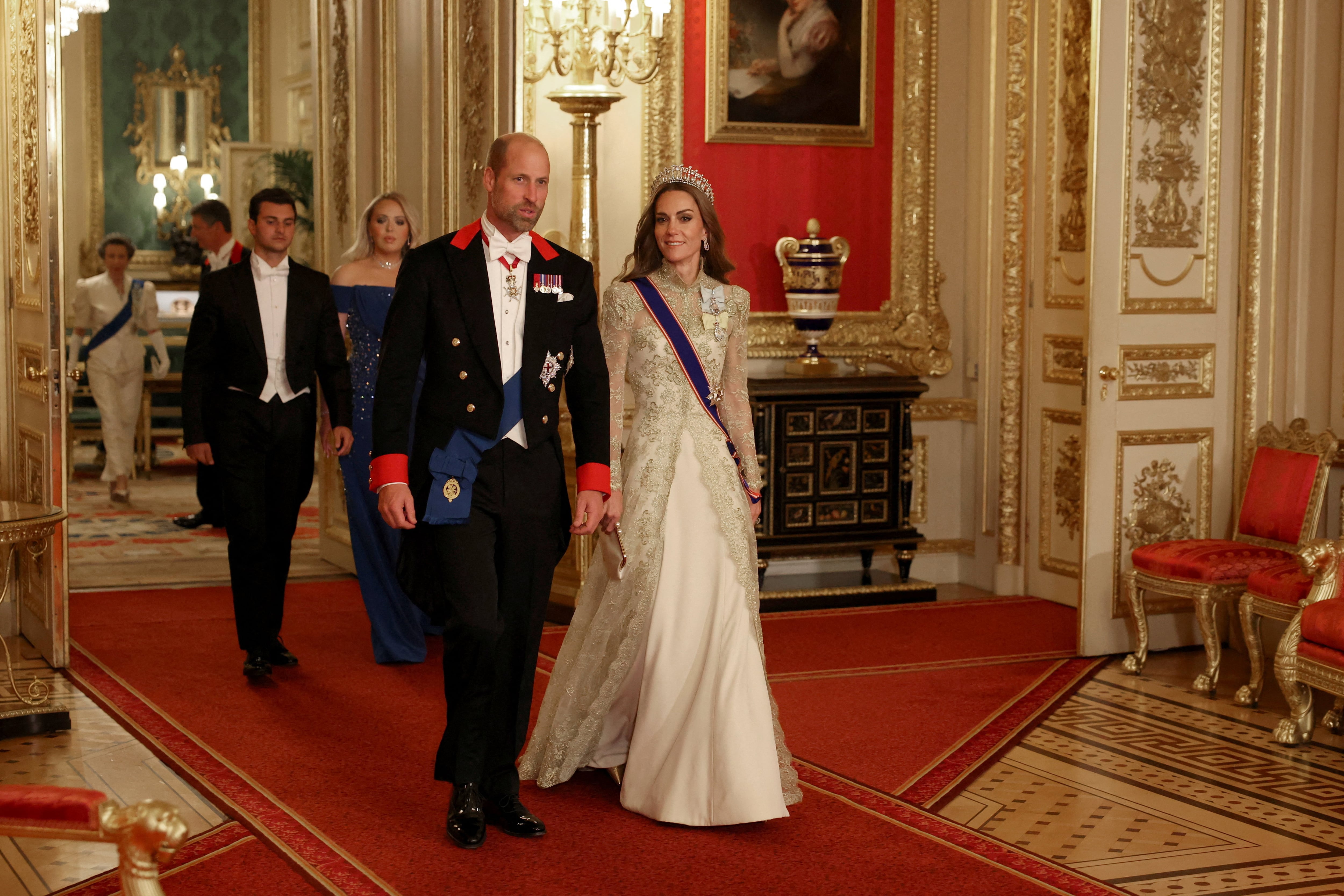 Britain's Prince William, Prince of Wales and Britain's Catherine, Princess of Wales arrive to attend a State Banquet at Windsor Castle, in Windsor, on September 17, 2025, during the second State Visit of US President Donald Trump. US President Donald Trump arrived in Britain for an unprecedented second State Visit, with the UK government rolling out a royal red carpet welcome to win over the mercurial leader. (Photo by Phil Noble / POOL / AFP)