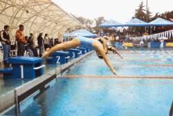01 de setiembre del 2005, 4:32pm a 6:00pm, Piscina María del Milagro París en la Sabana, XXXI torneo centroamericano equipos campeones y subcampeones de natación 2005, en la imagen la joven Jaquelin Suriano.