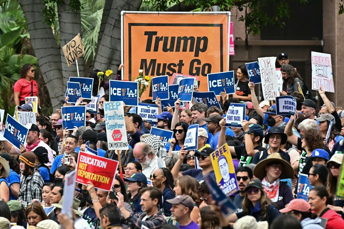 Demonstrators rally against US Immigration and Customs Enforcement (ICE) and call for the release of union leader David Huerta, President of SEIU California and SEIU-USWW, who was arrested on June 6 during federal immigration operations, at Gloria Molina Grand Park in Los Angeles, on June 9, 2025. Police ordered the public to disperse from downtown Los Angeles on June 8 after further unrest, with cars torched and security forces firing tear gas at protesters, in the wake of US President Donald Trump's deployment of National Guard troops to America's second-biggest city. Protests in Los Angeles, home to a large Latino population, broke out on June 6, triggered by immigration raids that resulted in dozens of arrests of what authorities say are illegal migrants and gang members. (Photo by Frederic J. Brown / AFP)