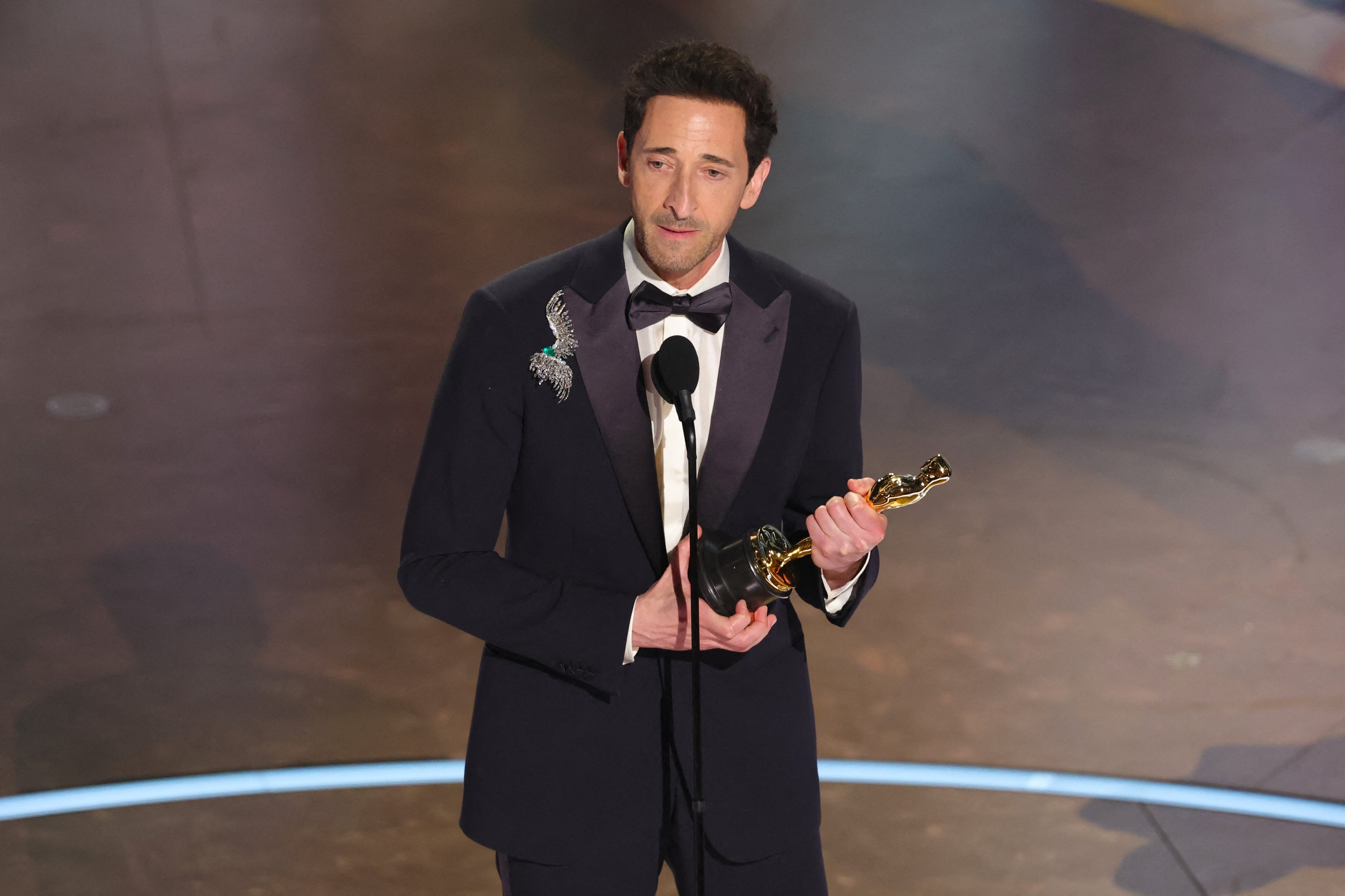 HOLLYWOOD, CALIFORNIA - MARCH 02: Adrien Brody accepts the Best Actor In A Leading Role award for "The Brutalist" onstage during the 97th Annual Oscars at Dolby Theatre on March 02, 2025 in Hollywood, California.   Kevin Winter/Getty Images/AFP (Photo by KEVIN WINTER / GETTY IMAGES NORTH AMERICA / Getty Images via AFP)