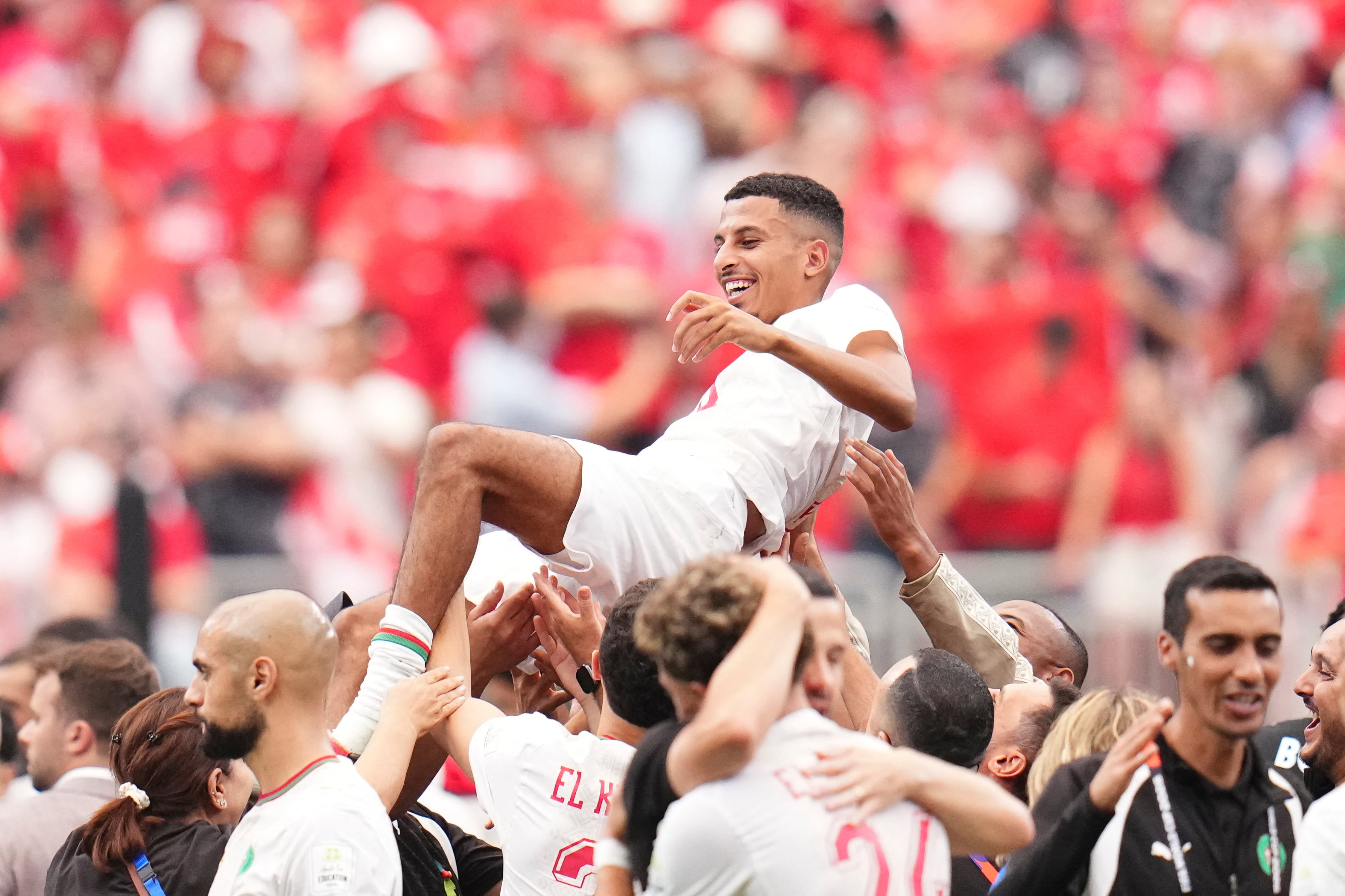 Azzedine Ounahi of Morocco is thrown into the air by teammates during the FIFA World Cup 2026 Round Of 16 match between Canada and Morocco at Houston Stadium on July 4, 2026 in Houston, United States. (Photo by Jose Breton/Pics Action/NurPhoto) (Photo by Jose Breton / NurPhoto via AFP)
