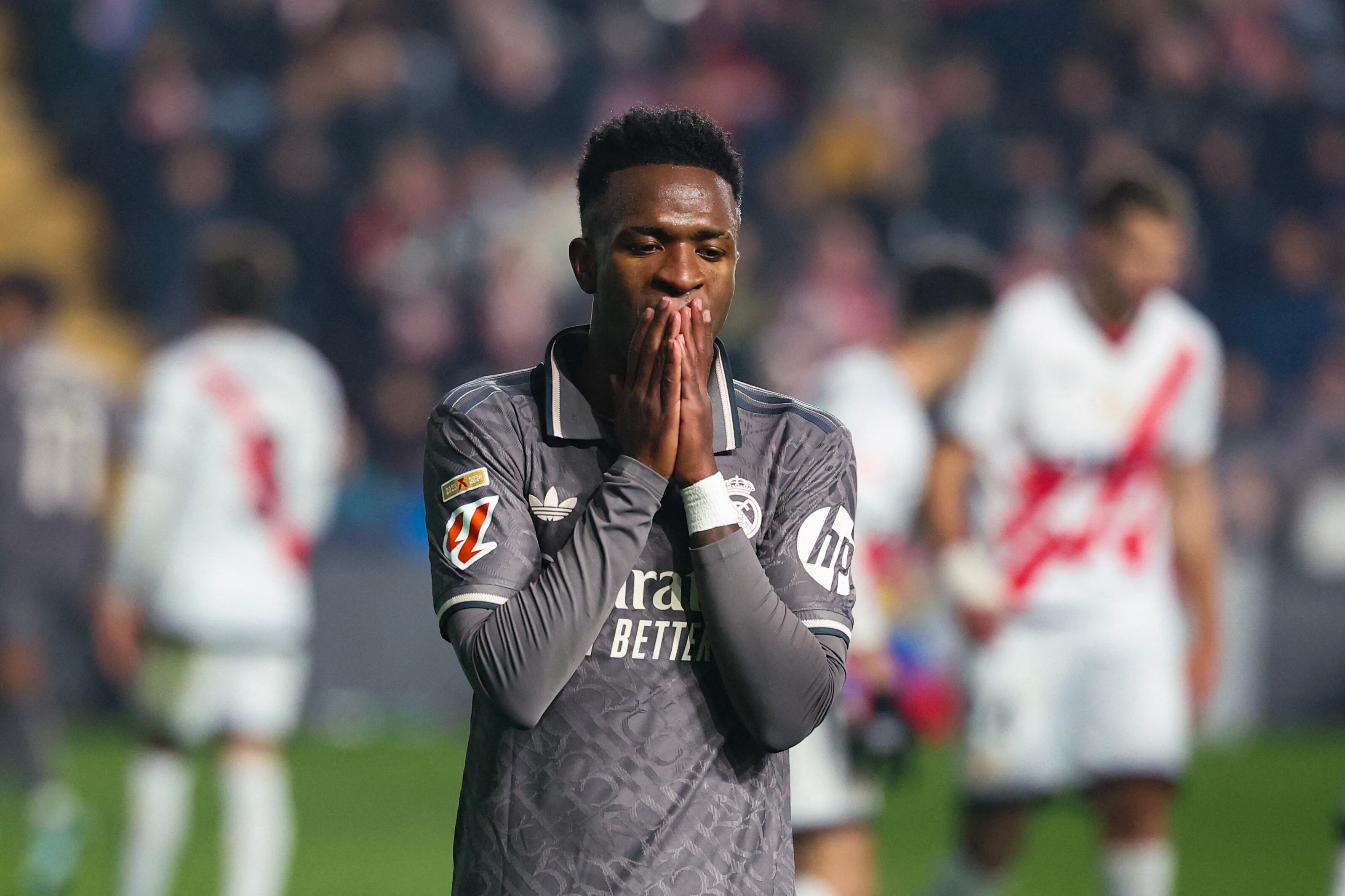 Real Madrid's Brazilian forward #07 Vinicius Junior reacts during the Spanish league football match between Rayo Vallecano de Madrid and Real Madrid CF at the Vallecas stadium in Madrid on December 14, 2024. (Photo by Pierre-Philippe MARCOU / AFP).