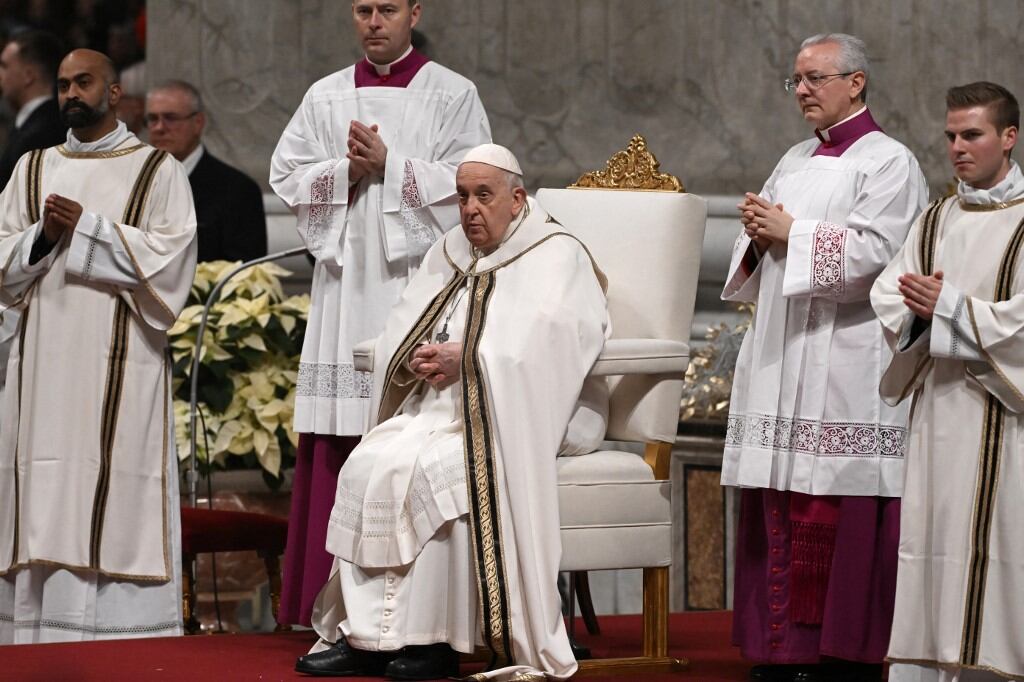 Pope Francis presides the Christmas Eve mass at St. Peter's Basilica in the Vatican on December 24, 2023. (Photo by Tiziana FABI / AFP)