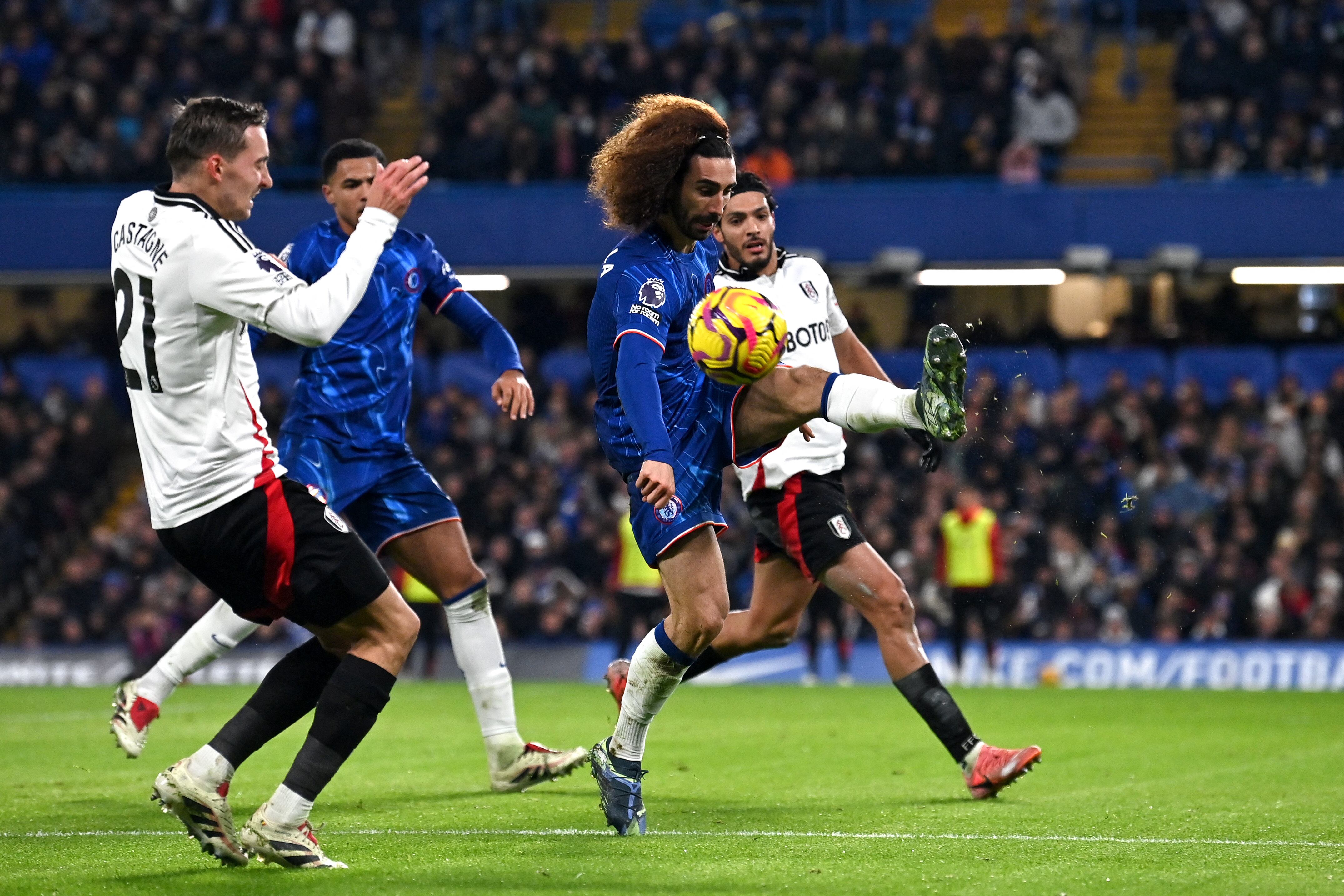 Chelsea's Spanish defender #03 Marc Cucurella controls the ball during the English Premier League football match between Chelsea and Fulham at Stamford Bridge in London on December 26, 2024. (Photo by Glyn KIRK / AFP) / RESTRICTED TO EDITORIAL USE. No use with unauthorized audio, video, data, fixture lists, club/league logos or 'live' services. Online in-match use limited to 120 images. An additional 40 images may be used in extra time. No video emulation. Social media in-match use limited to 120 images. An additional 40 images may be used in extra time. No use in betting publications, games or single club/league/player publications. /