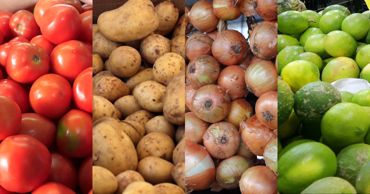 Fotografía de tomates, papas, cebollas y limones frescos en un mercado, productos agrícolas de consumo interno cuyas importaciones aumentaron en Costa Rica entre 2023 y 2024, impactando a los productores locales.