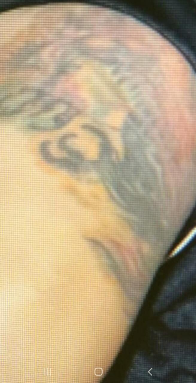 Este es el tatuaje que permitiría identificar a la víctima. Foto: OIJ.